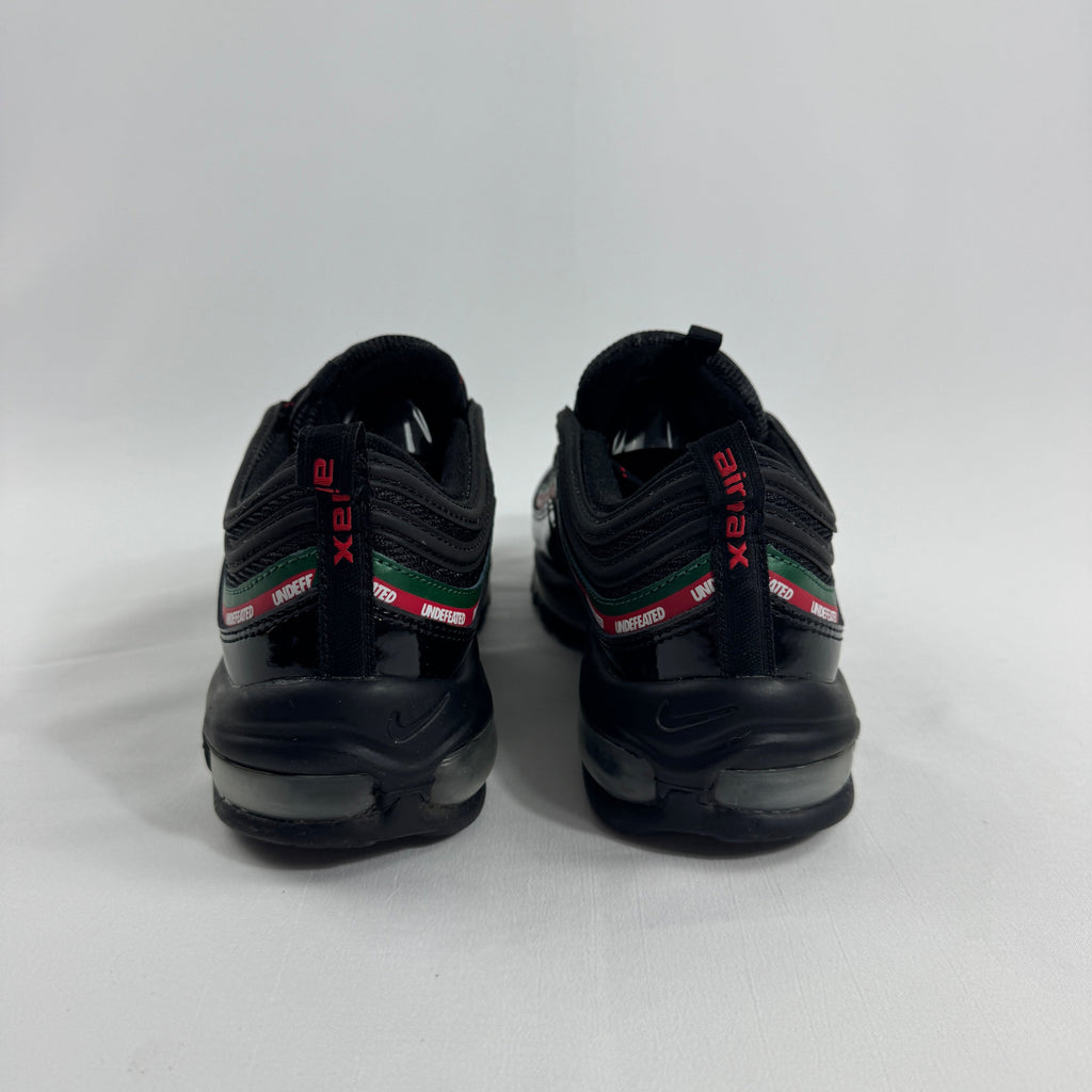 Air Max 97 Undefeated Black Volt combines the iconic Air Max 97 design with Undefeated’s bold streetwear aesthetic.