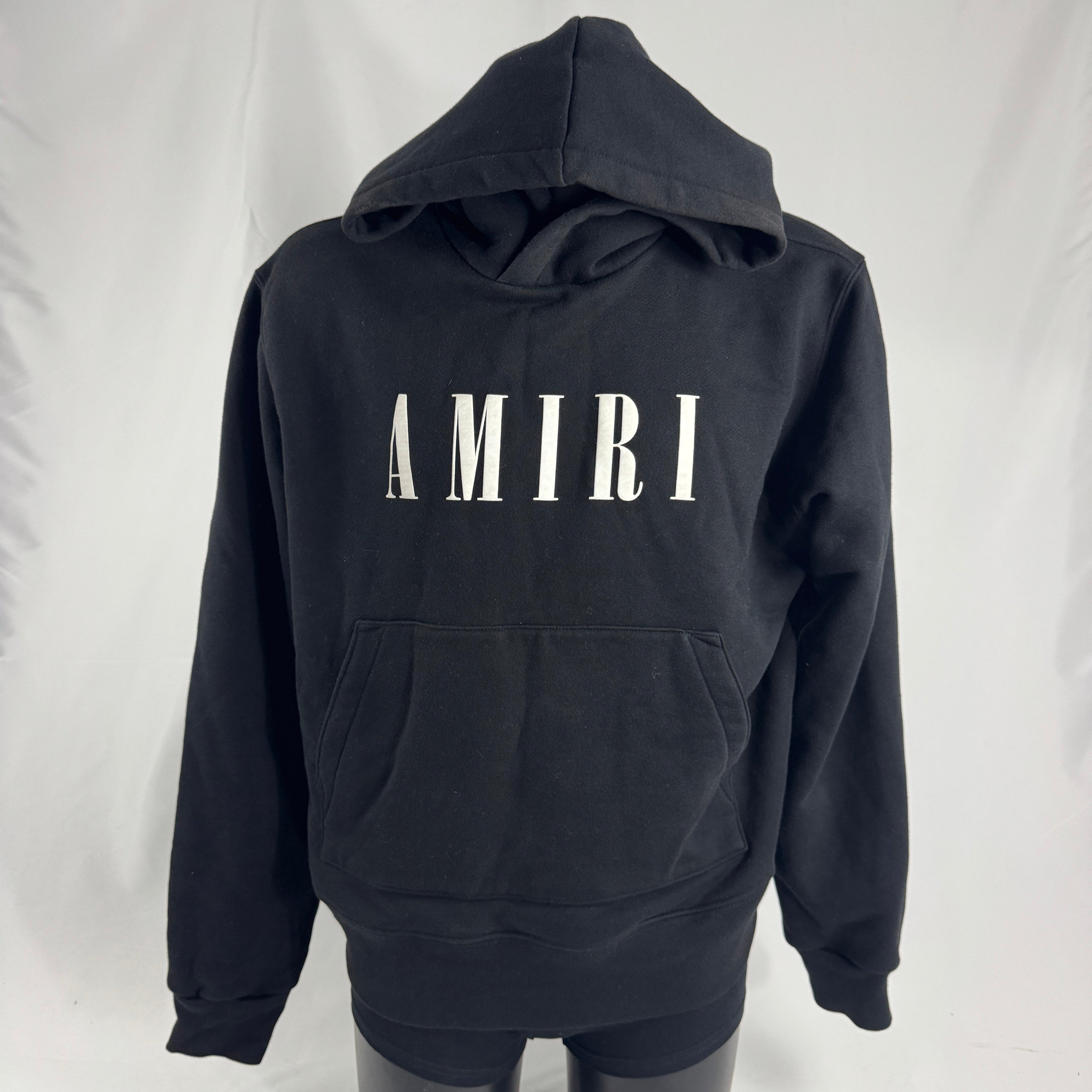 Amiri Black Logo Hoodie crafted from premium cotton, featuring the signature Amiri logo, ribbed trims, and a relaxed fit for