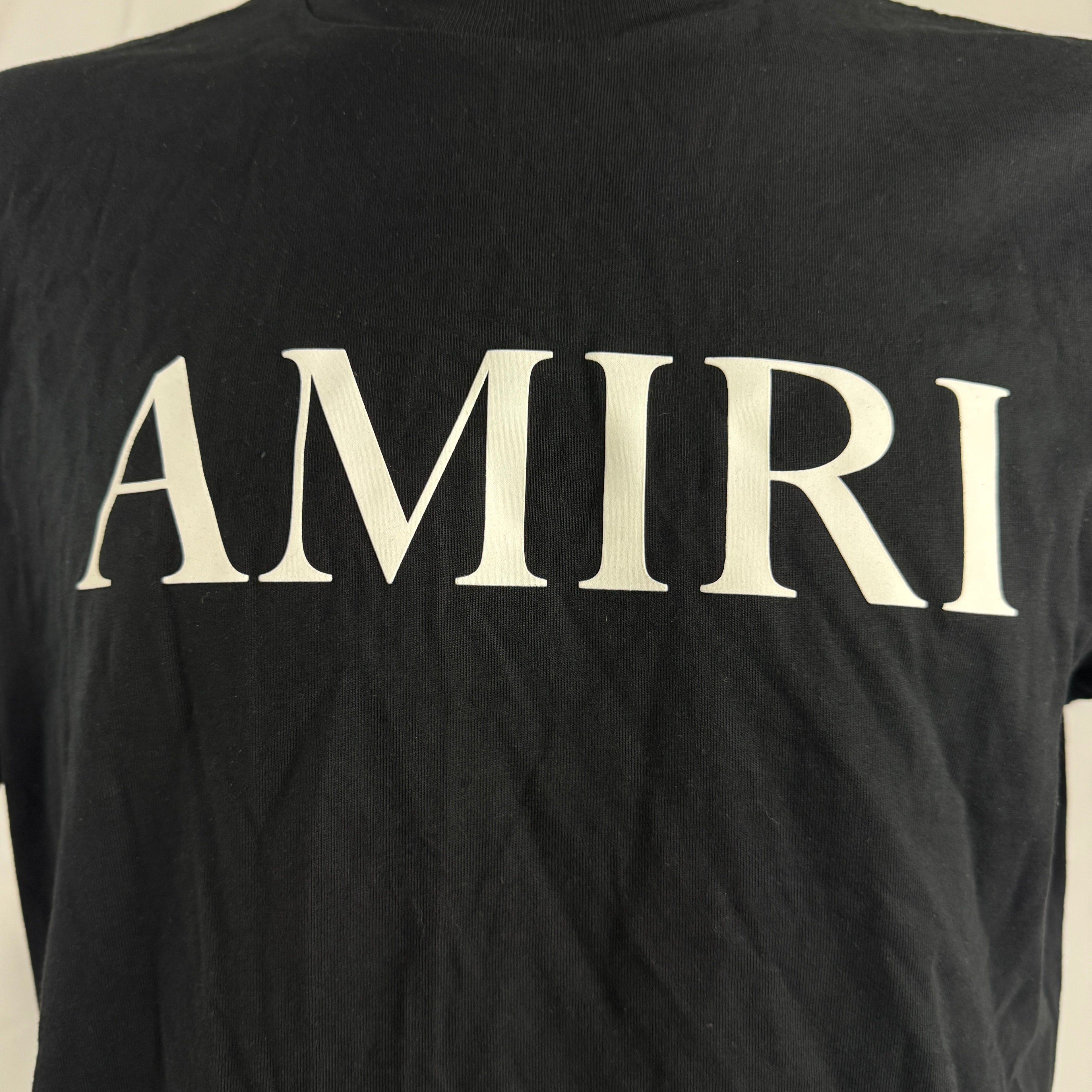 Amiri Core Logo Print Shirt crafted from premium cotton, featuring the signature Core logo print, a classic collar,