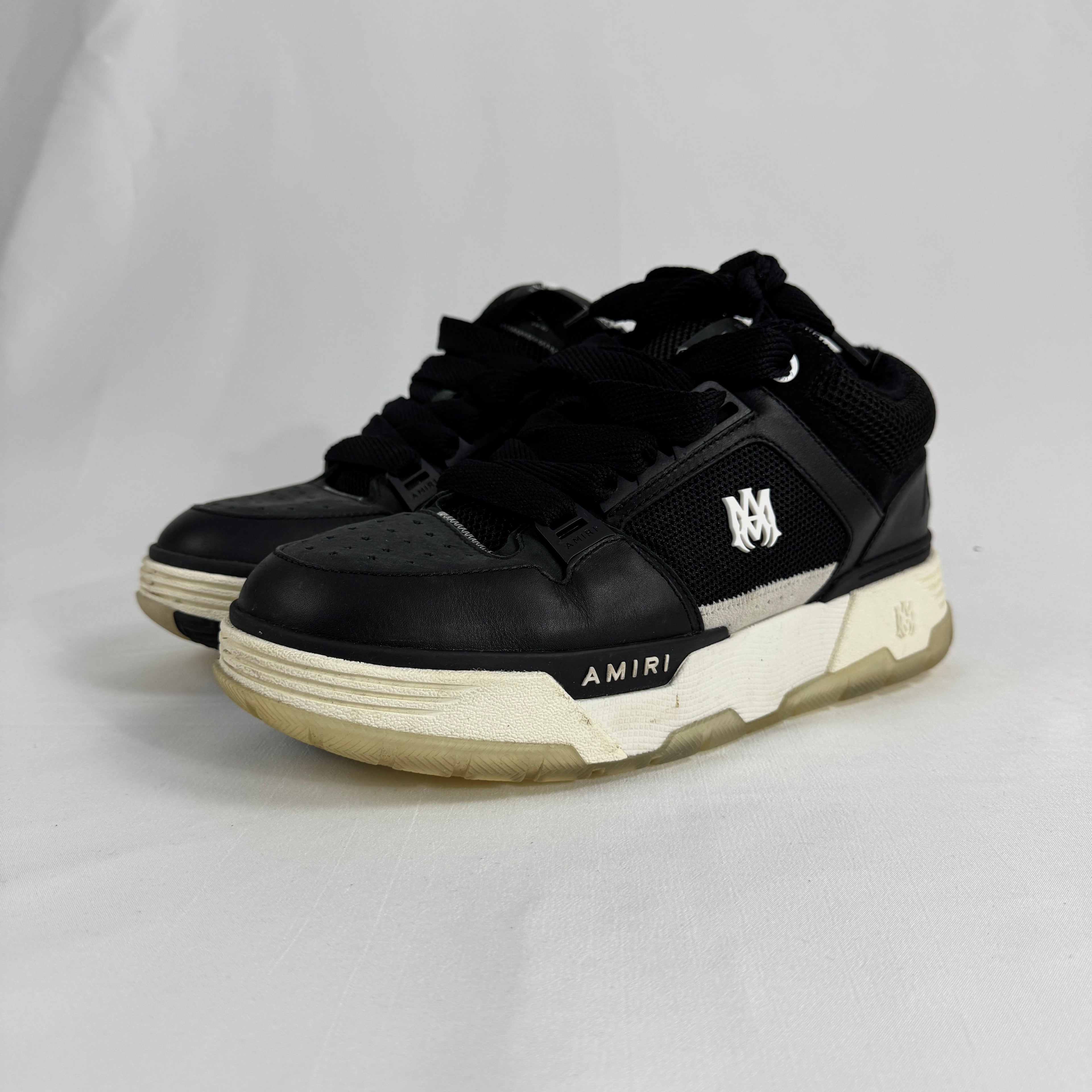 The Amiri MA-1 Trainers showcase a luxury take on classic basketball-inspired footwear. Crafted from premium leather with