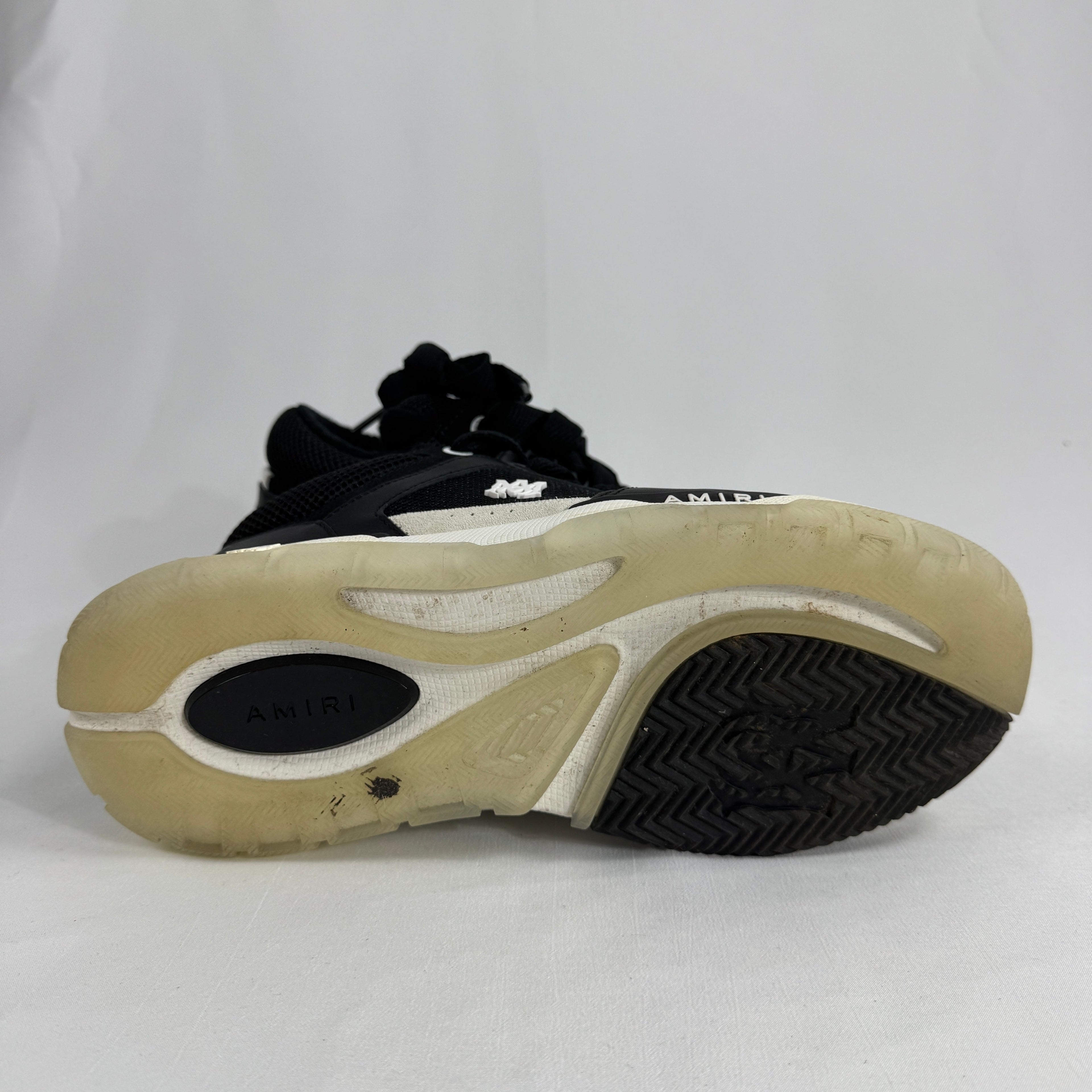 The Amiri MA-1 Trainers showcase a luxury take on classic basketball-inspired footwear. Crafted from premium leather with