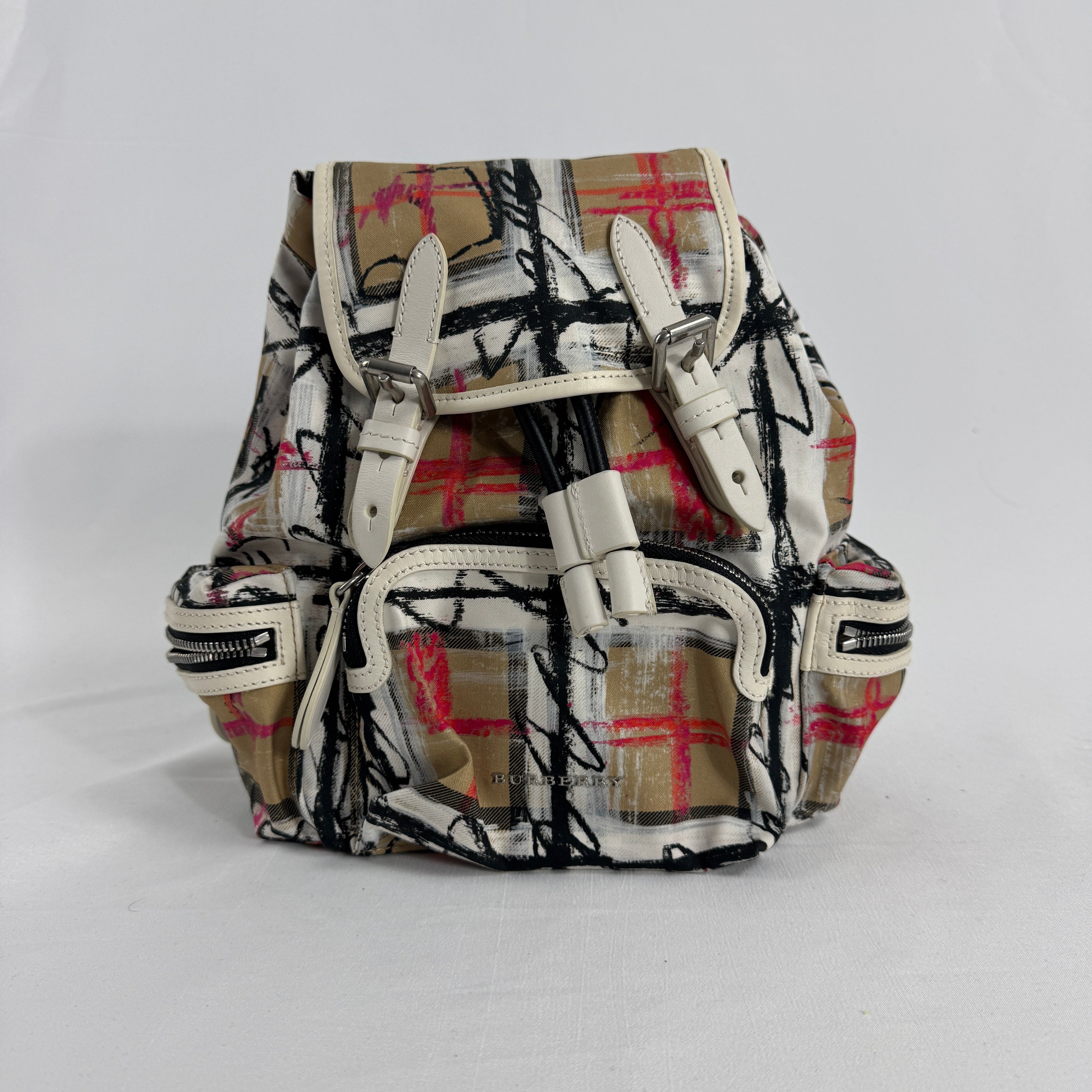 The Burberry Multi Canvas Backpack is a luxury backpack made from durable canvas with Burberry’s signature patterns and
