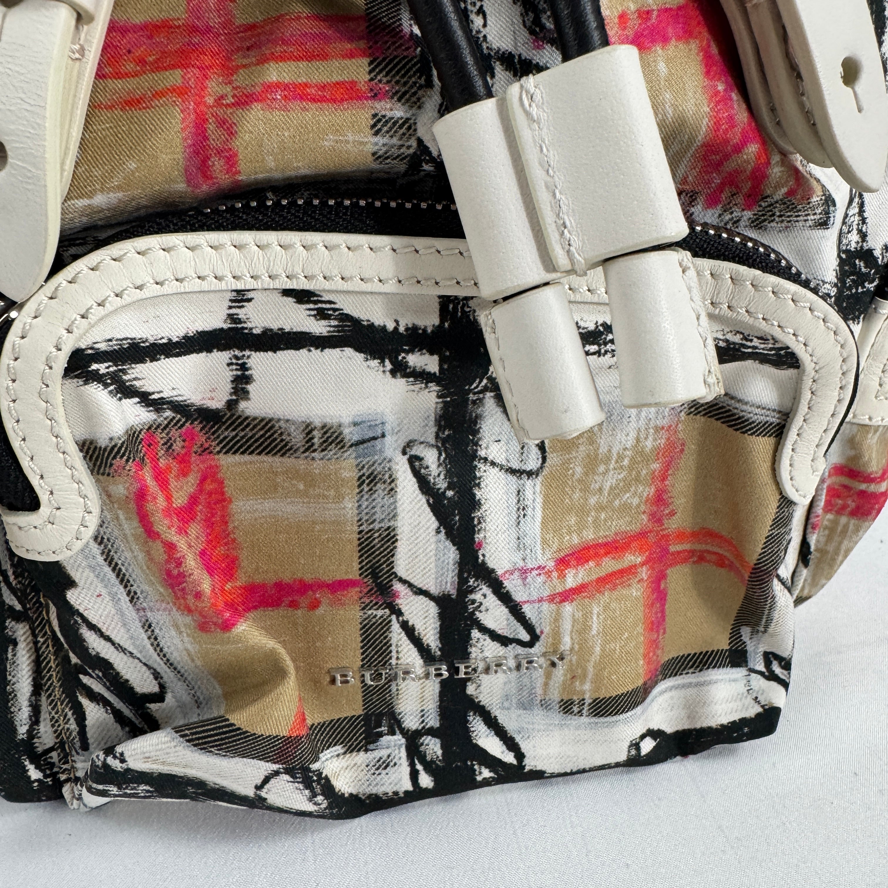 The Burberry Multi Canvas Backpack is a luxury backpack made from durable canvas with Burberry’s signature patterns and