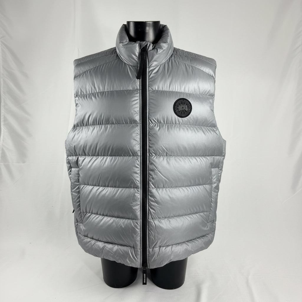 The Canada Goose Crofton Gilet is a lightweight, packable down vest designed for layering in cold but not extreme weather.