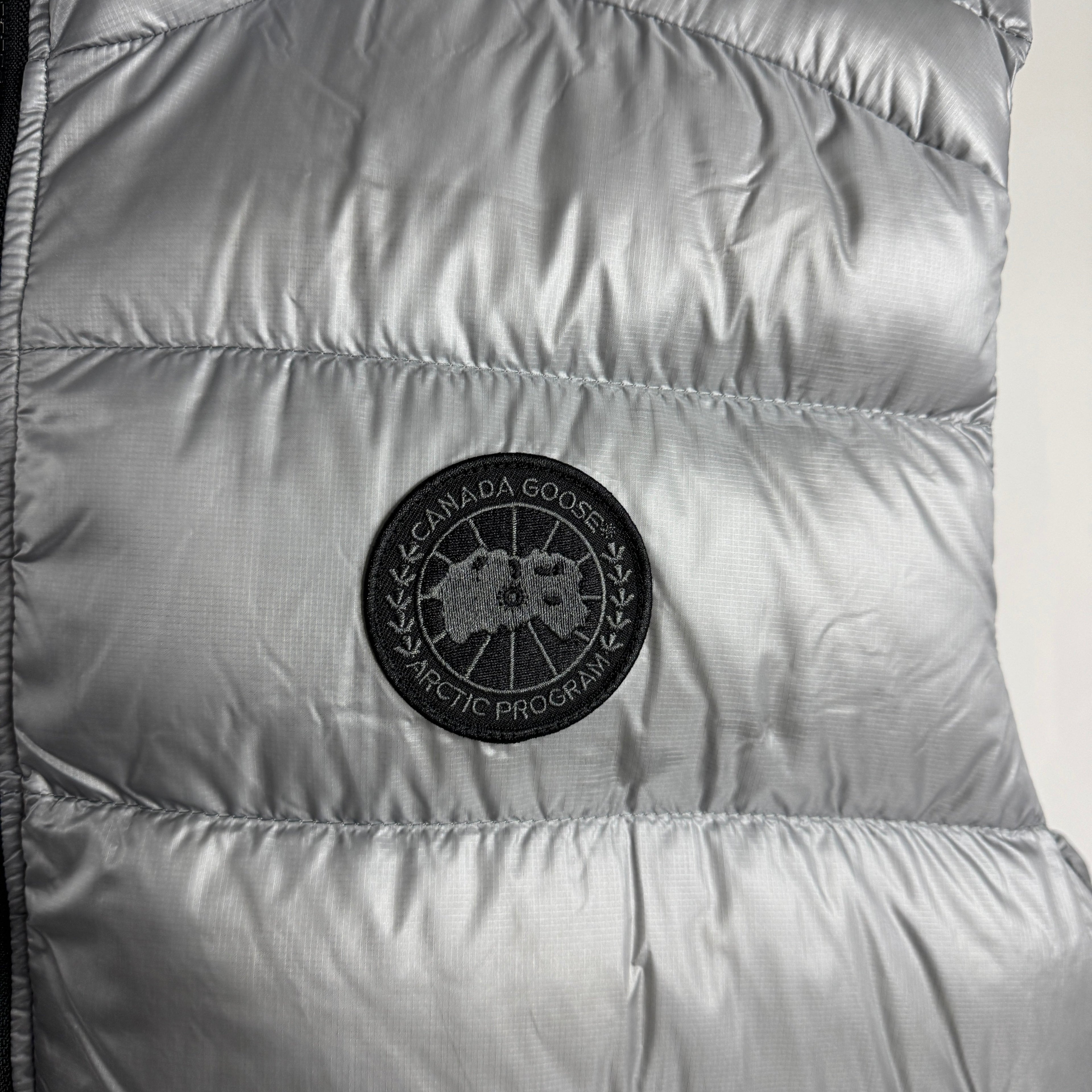 The Canada Goose Crofton Gilet is a lightweight, packable down vest designed for layering in cold but not extreme weather.