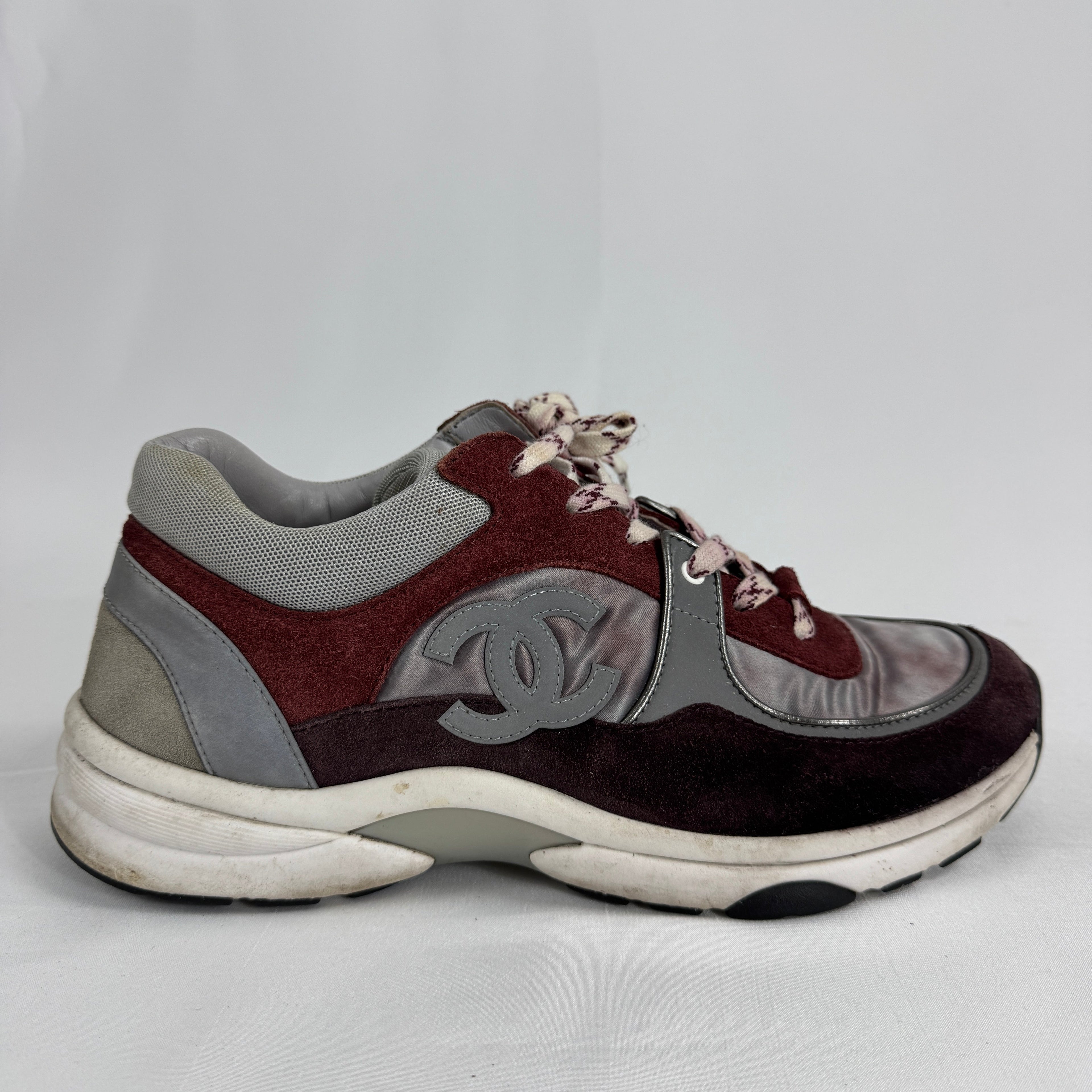 The Chanel CC Low Top is a luxury sneaker that combines sporty influences with the brand’s signature elegance. Crafted from