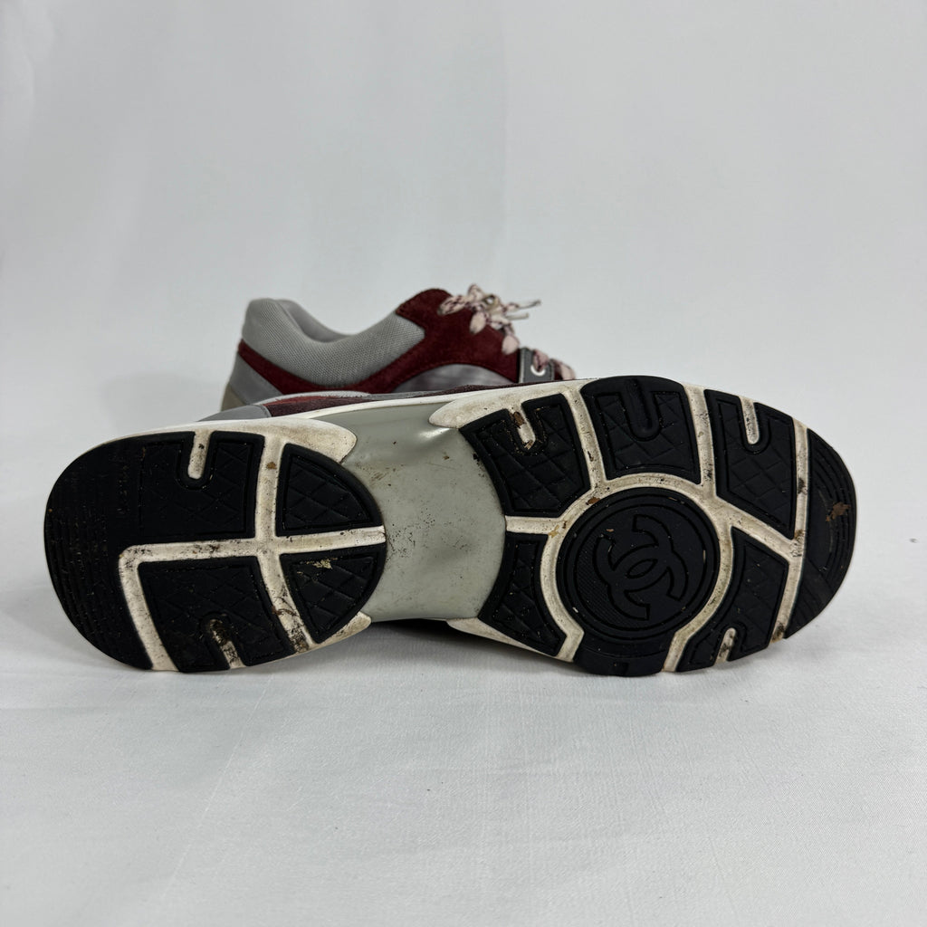 The Chanel CC Low Top is a luxury sneaker that combines sporty influences with the brand’s signature elegance. Crafted from