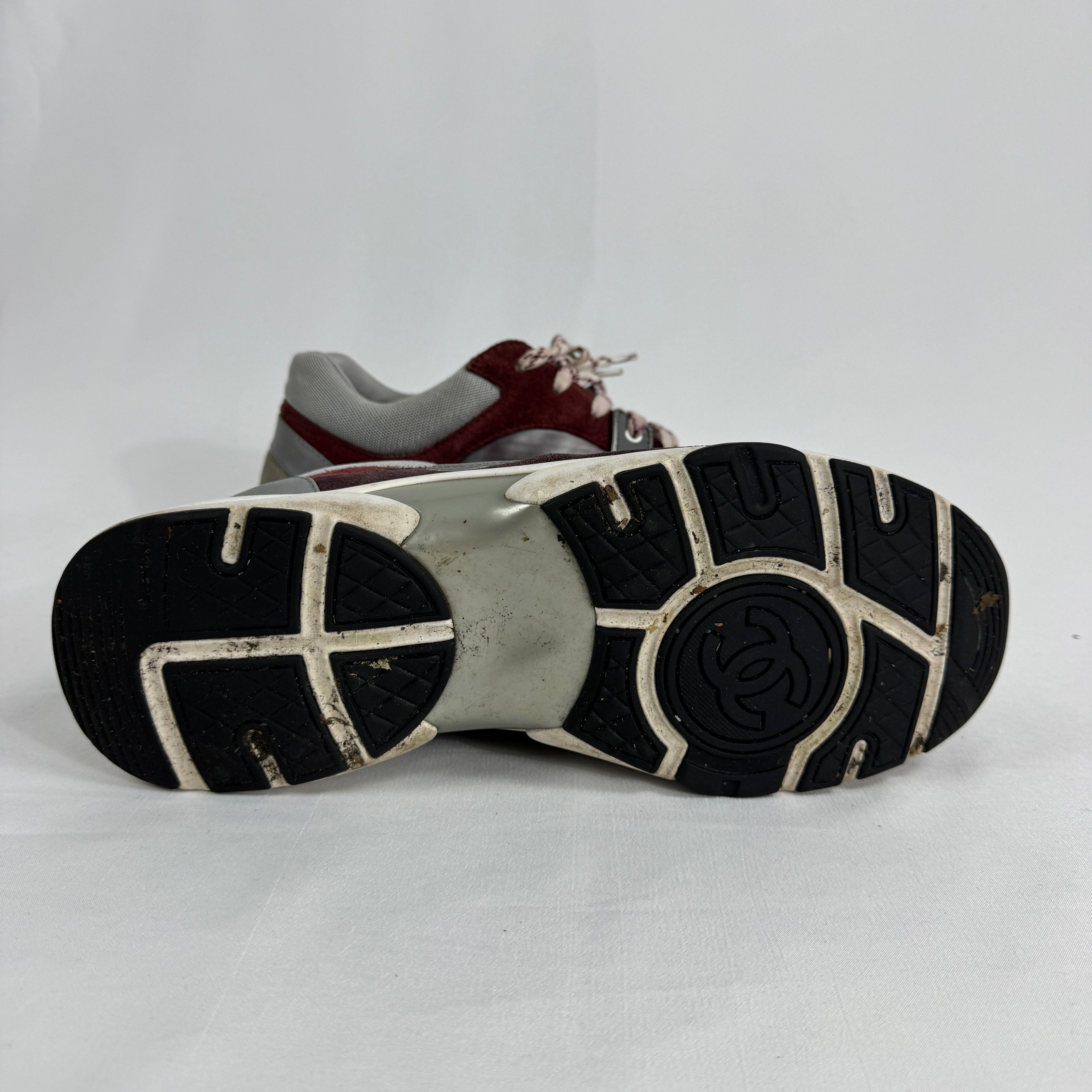 The Chanel CC Low Top is a luxury sneaker that combines sporty influences with the brand’s signature elegance. Crafted from
