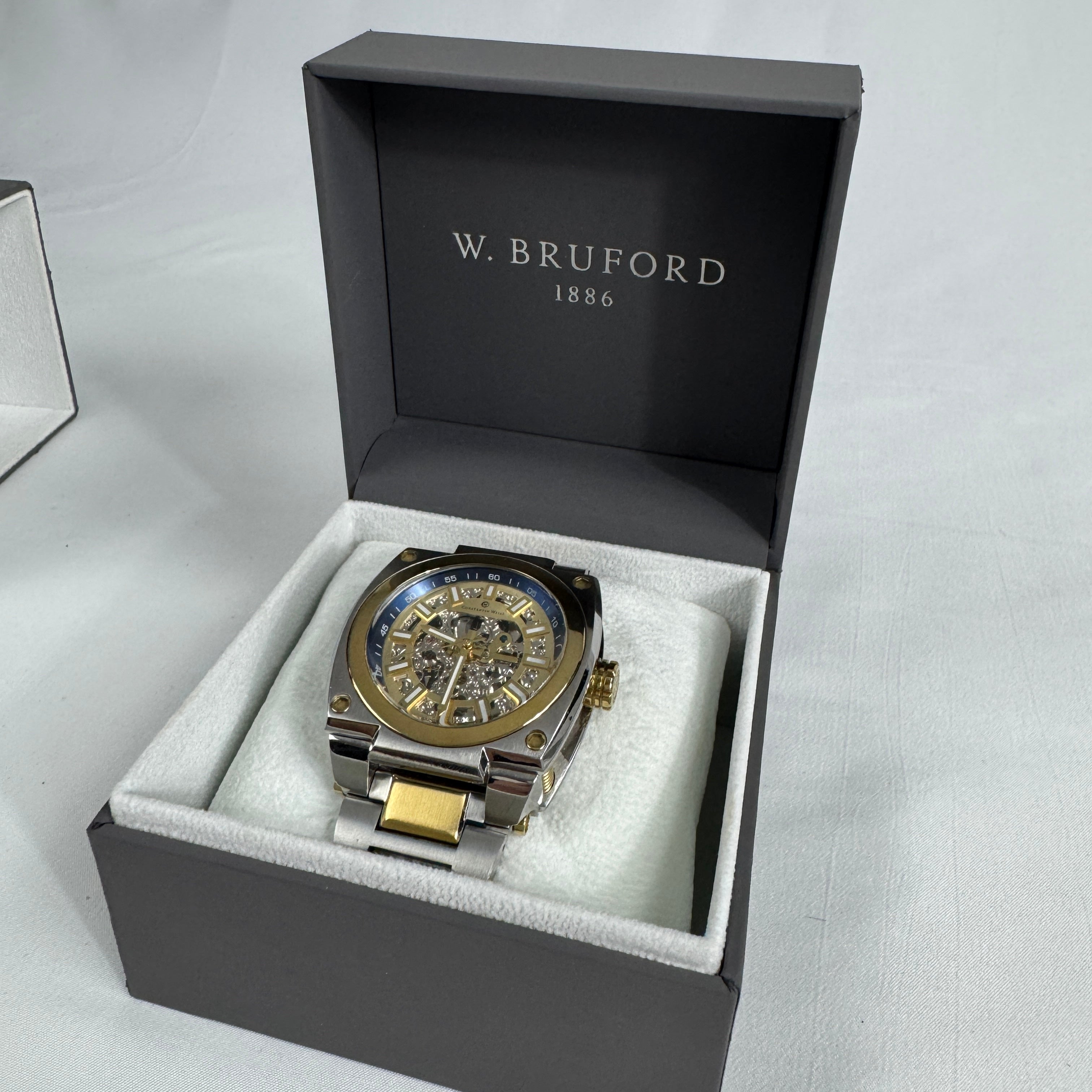 The Constantin Weisz Two Tone Skeleton Automatic is a mechanical watch featuring a visible skeleton dial, a stainless steel