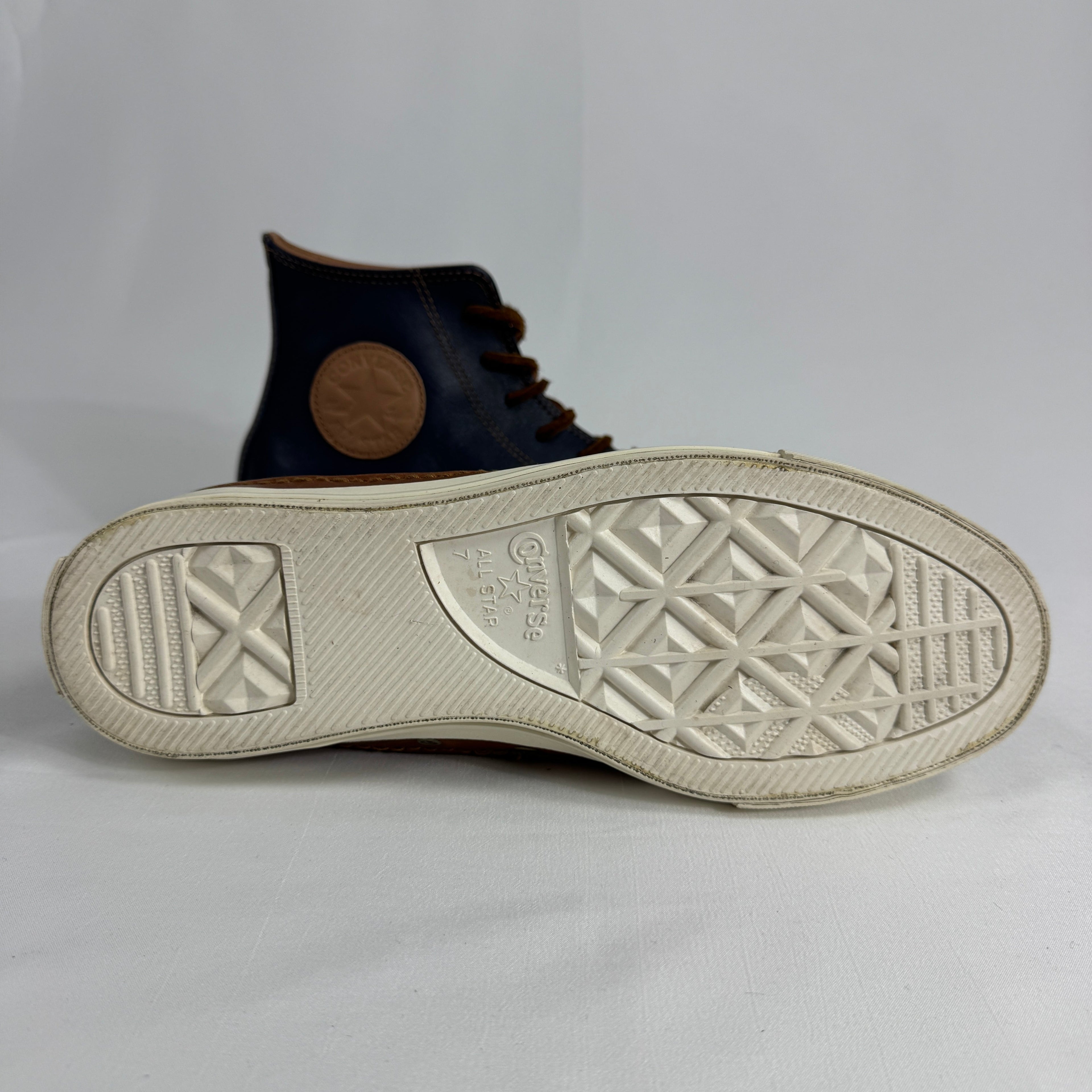 The Converse Chuck Taylor All Star Premium is an elevated version of the iconic sneaker, featuring high-quality materials,