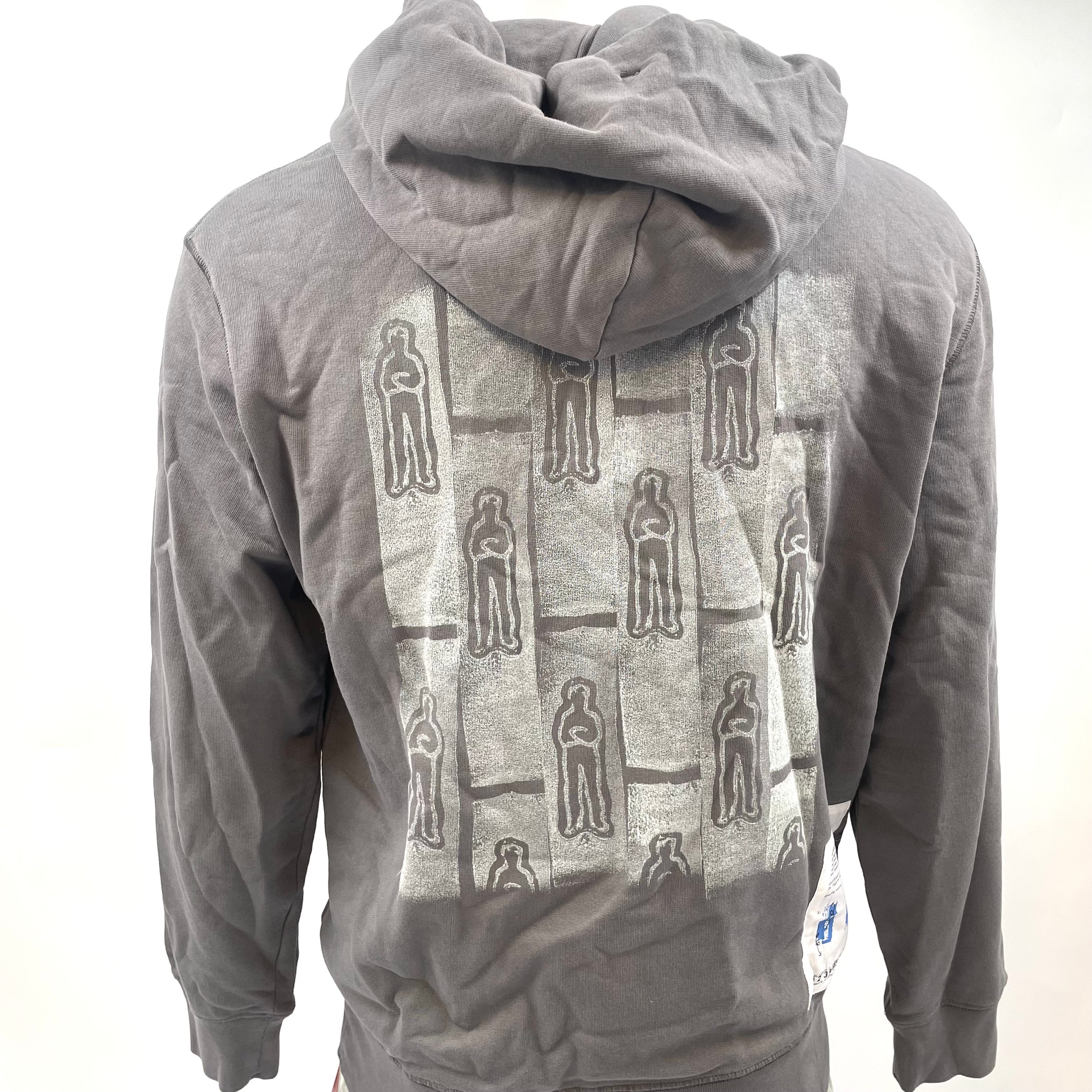CP Company Graphic Hoodie crafted from premium cotton, featuring a bold graphic design, adjustable drawstring hood, ribbed