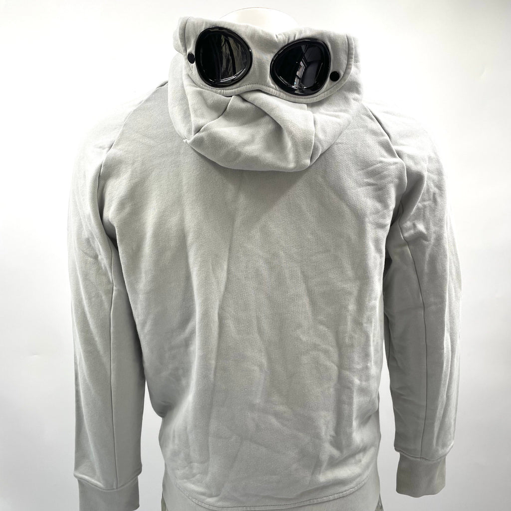 CP Company Hooded Zipup Grey crafted from premium fabric, featuring a full zip closure, adjustable hood, signature C.P.