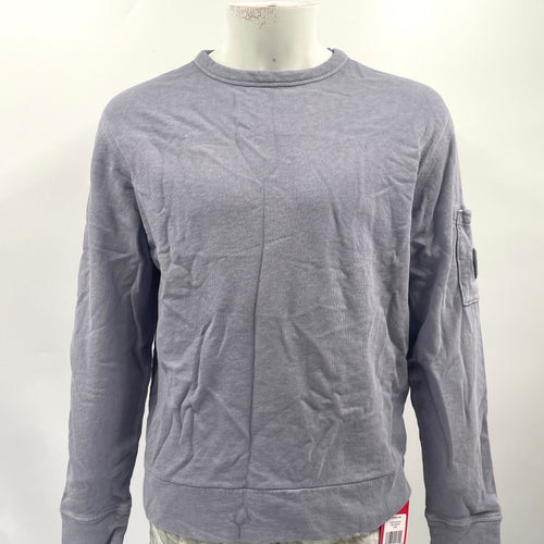 CP Company Lavender Crew Neck crafted from premium cotton, featuring a classic crew neck design, signature C.P. Company