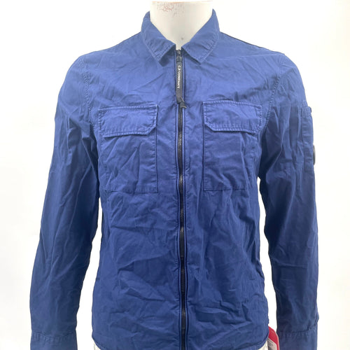 CP Company Navy Overshirt crafted from premium fabric, featuring a classic button-front design, signature C.P. Company