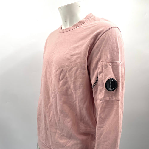 CP Company Pink Crewneck crafted from premium cotton, featuring a classic crew neck design, signature C.P. Company
