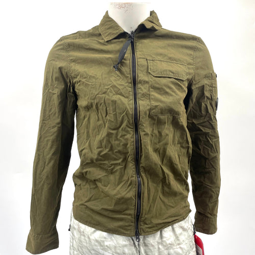 CP Company Zip Overshirt Ivy Green crafted from premium fabric, featuring a full zip closure, signature C.P. Company