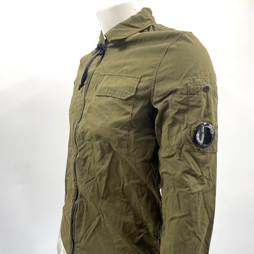 CP Company Zip Overshirt Ivy Green crafted from premium fabric, featuring a full zip closure, signature C.P. Company