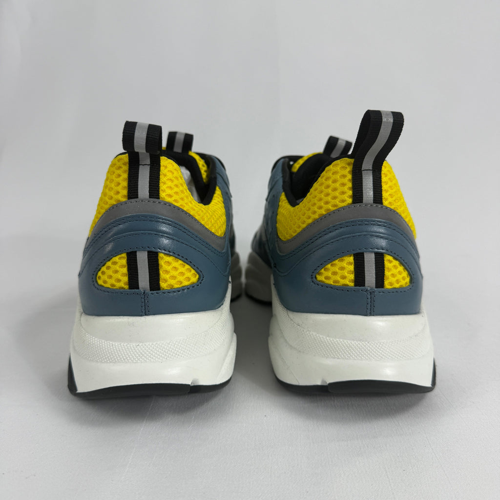 The Dior B22 Blue/Beige is a luxury chunky sneaker that blends retro running-inspired design with modern high-fashion style.