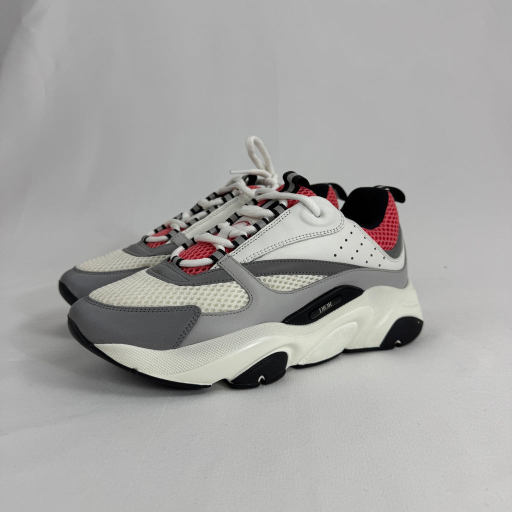 The Dior B22 White/Pink is a luxury sneaker that blends a chunky, retro-inspired silhouette with modern fashion appeal.