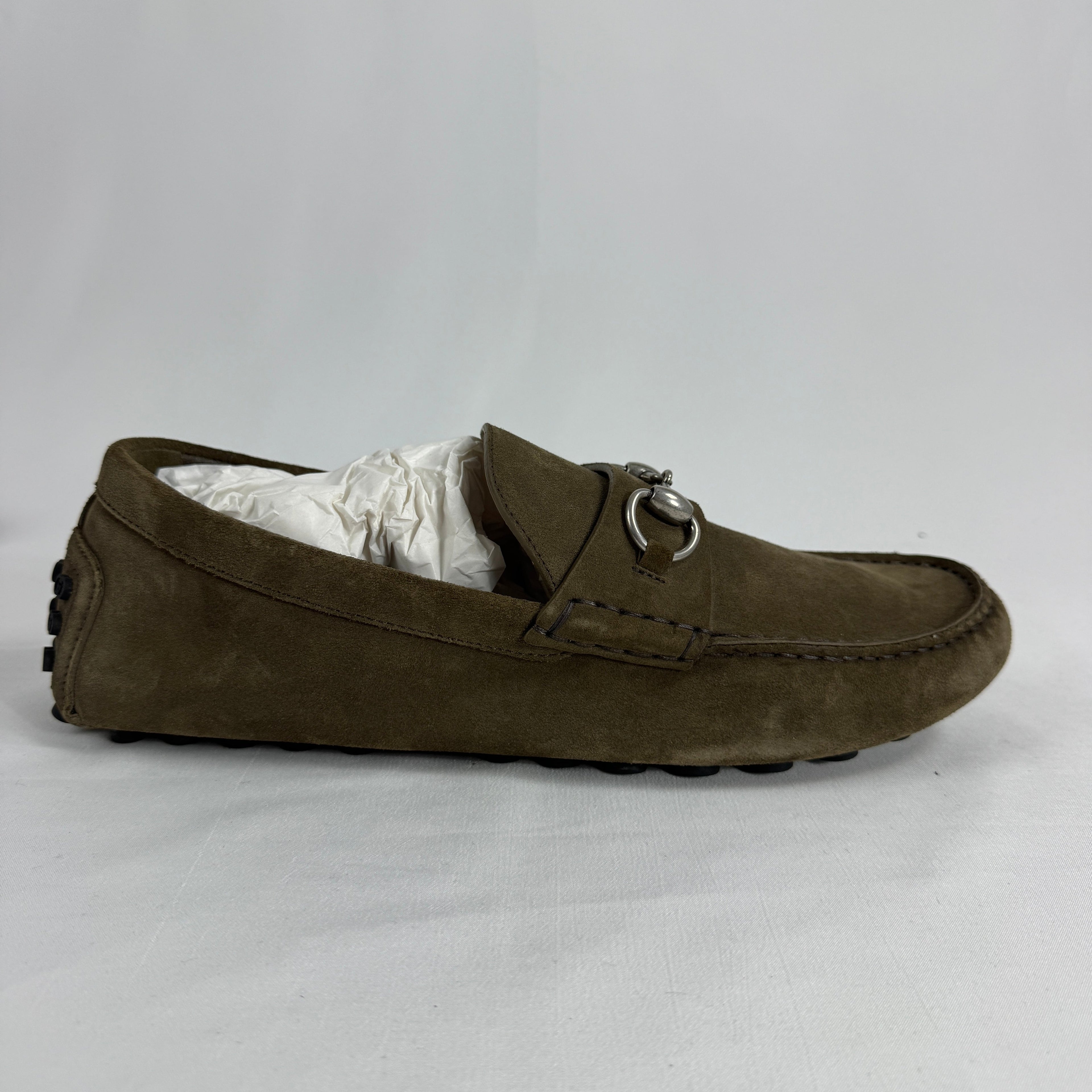The Gucci Byron Driver Suede Loafers combine classic Italian craftsmanship with relaxed sophistication. Crafted from soft