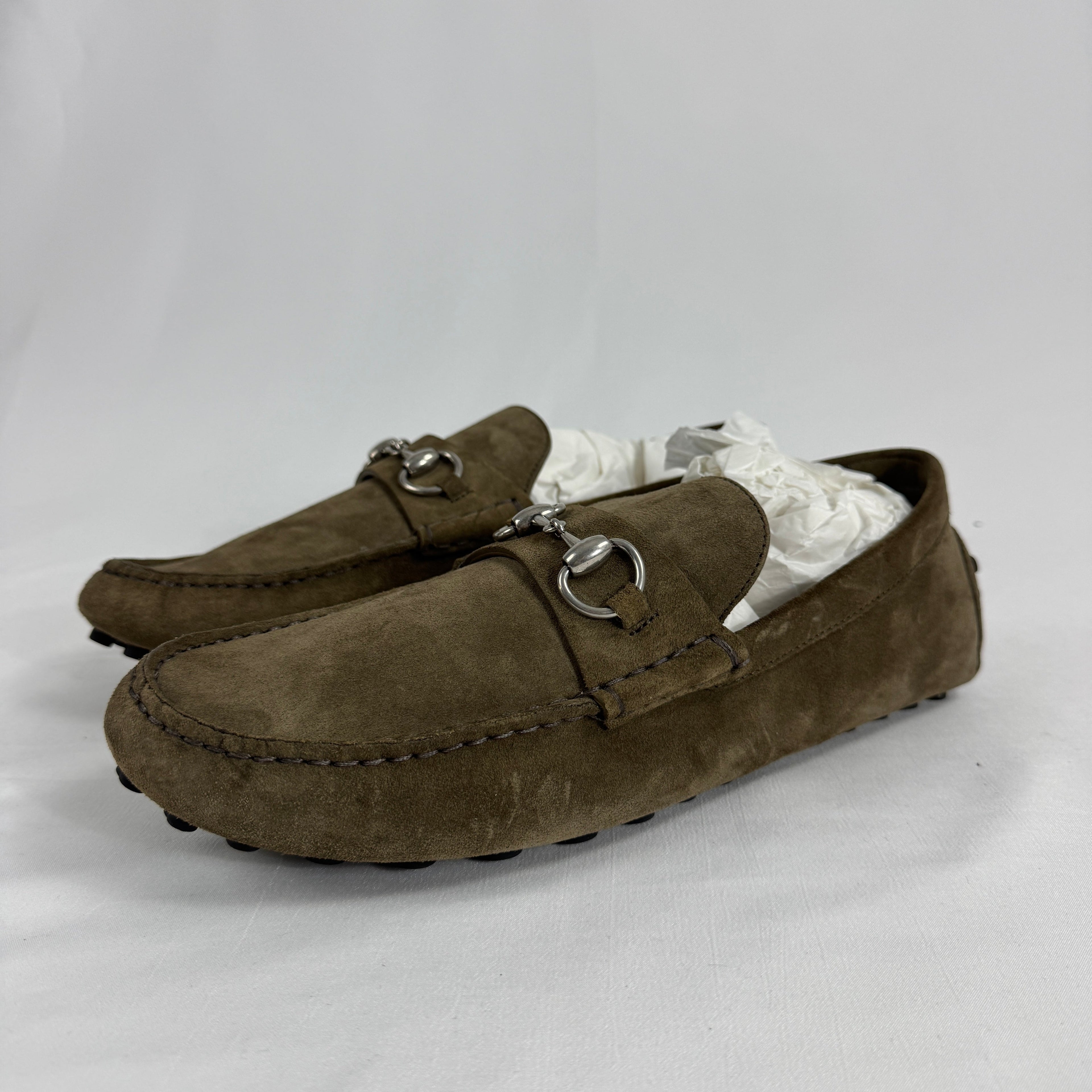 The Gucci Byron Driver Suede Loafers combine classic Italian craftsmanship with relaxed sophistication. Crafted from soft