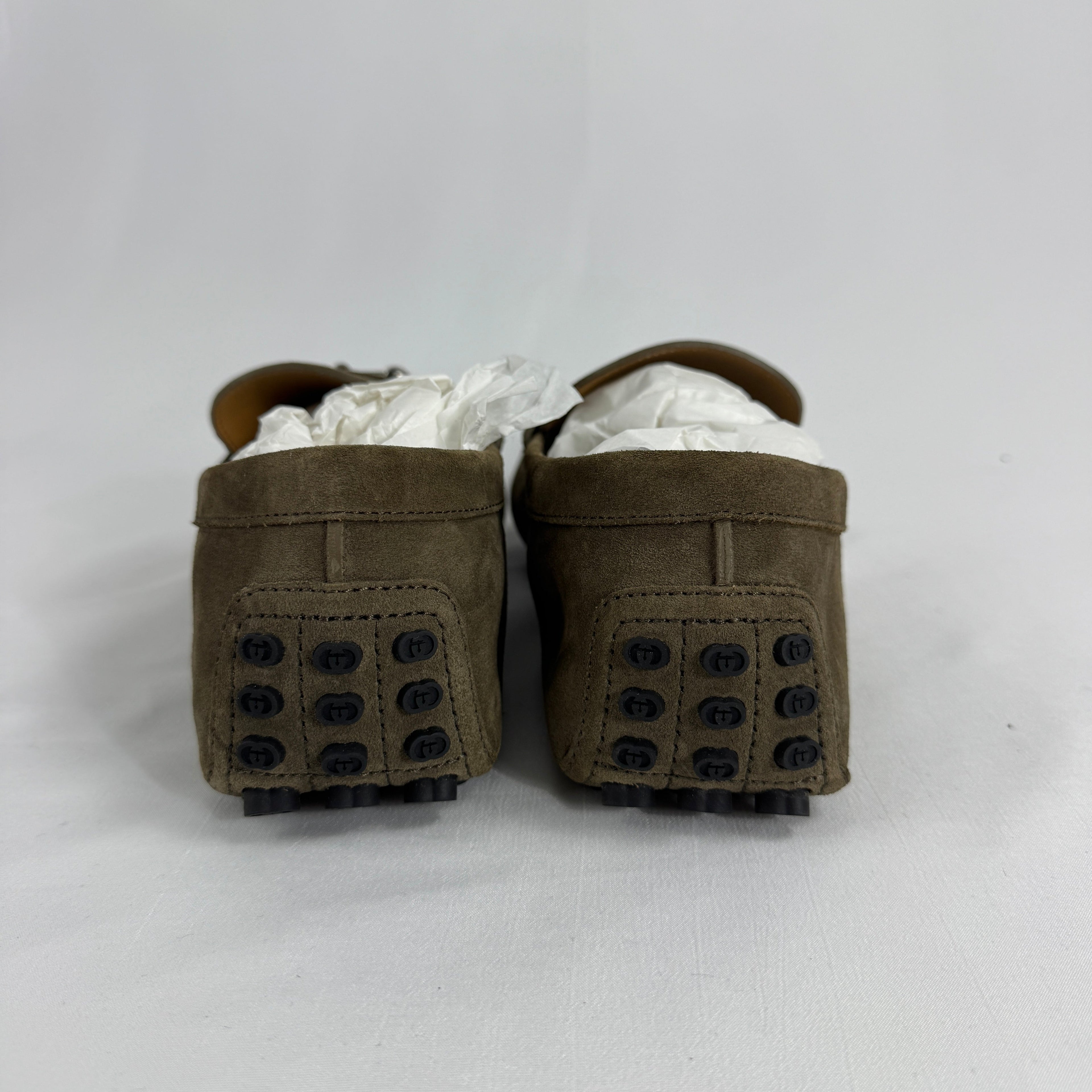 The Gucci Byron Driver Suede Loafers combine classic Italian craftsmanship with relaxed sophistication. Crafted from soft
