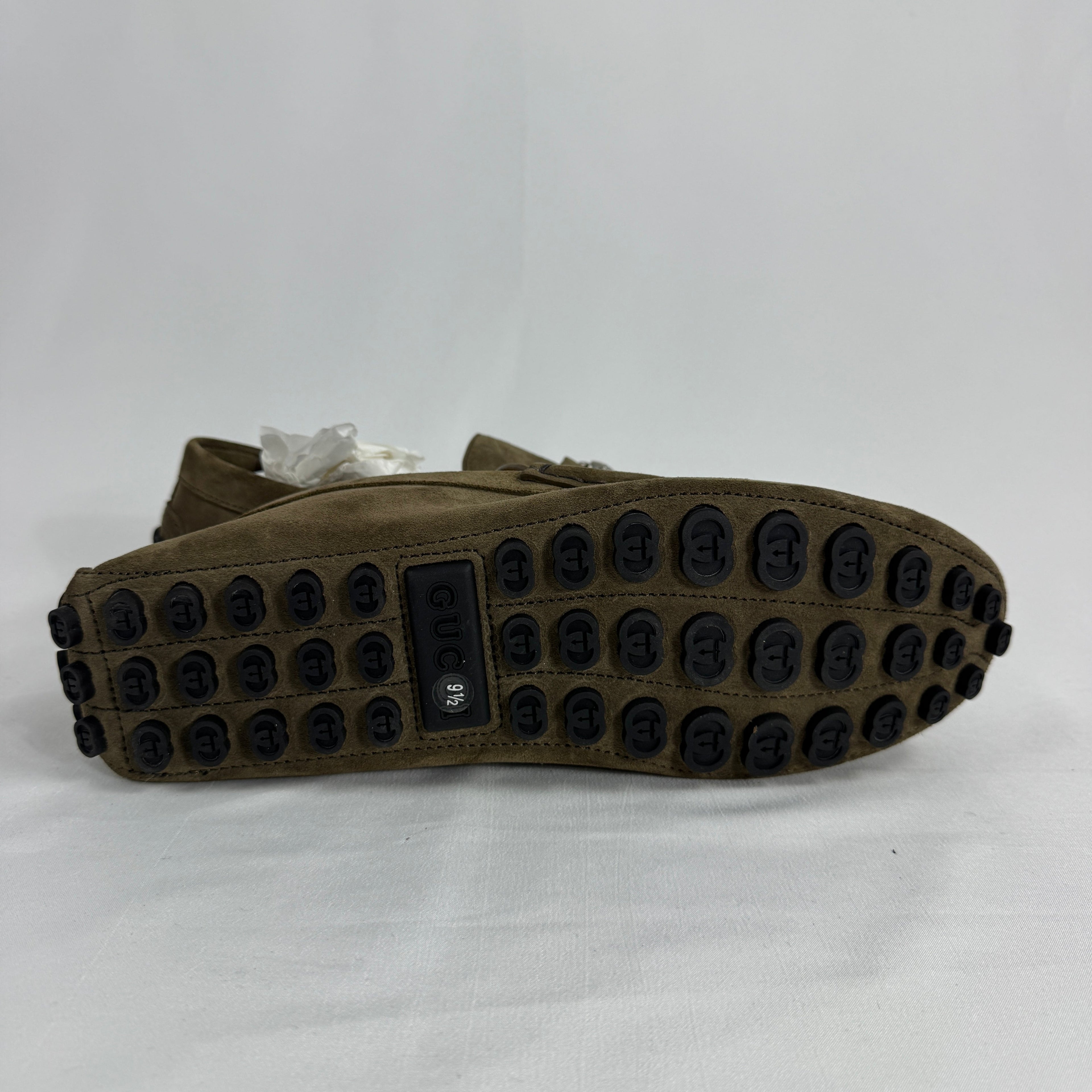 The Gucci Byron Driver Suede Loafers combine classic Italian craftsmanship with relaxed sophistication. Crafted from soft
