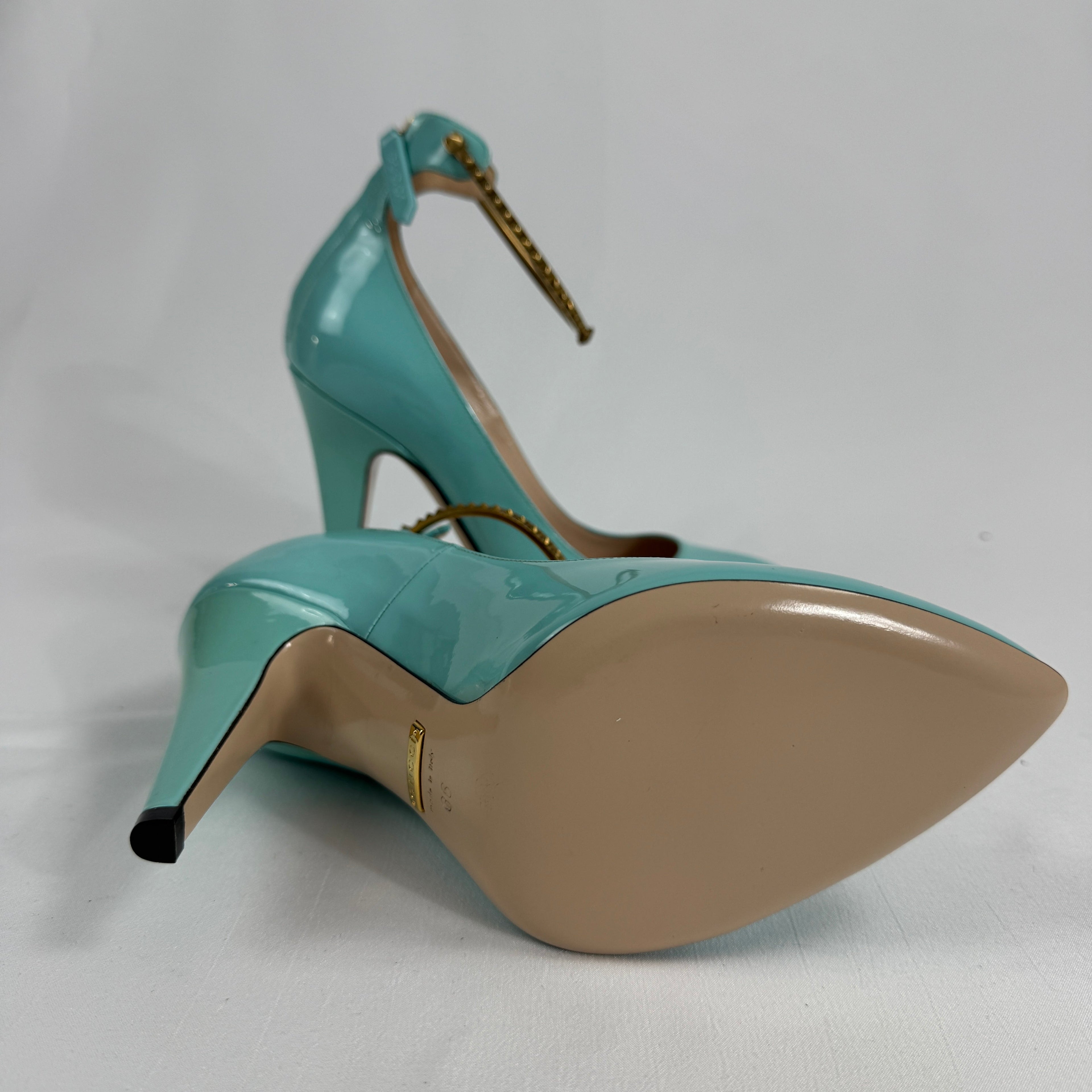 The Gucci Patent Leather Heels offer a sophisticated and timeless look, crafted from glossy patent leather for a polished
