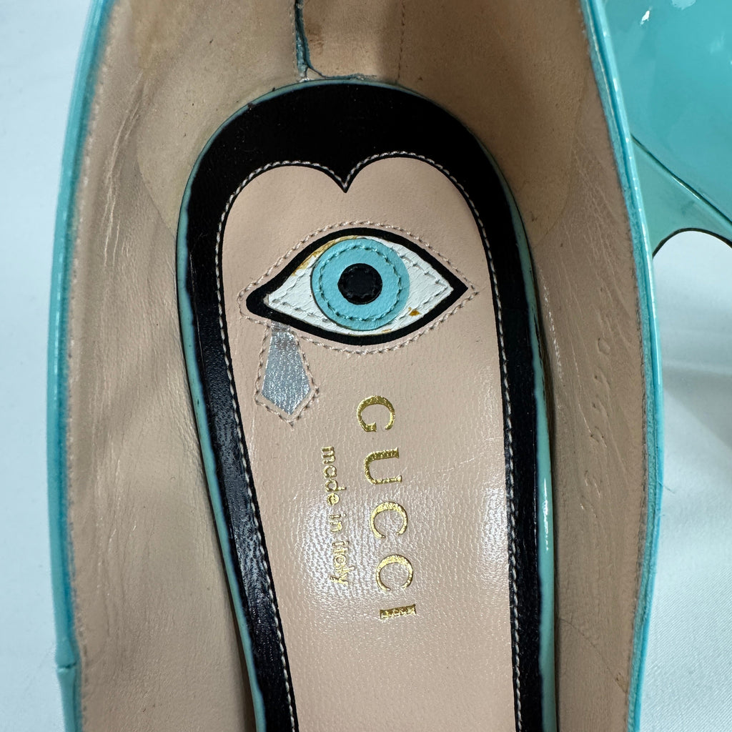The Gucci Patent Leather Heels offer a sophisticated and timeless look, crafted from glossy patent leather for a polished