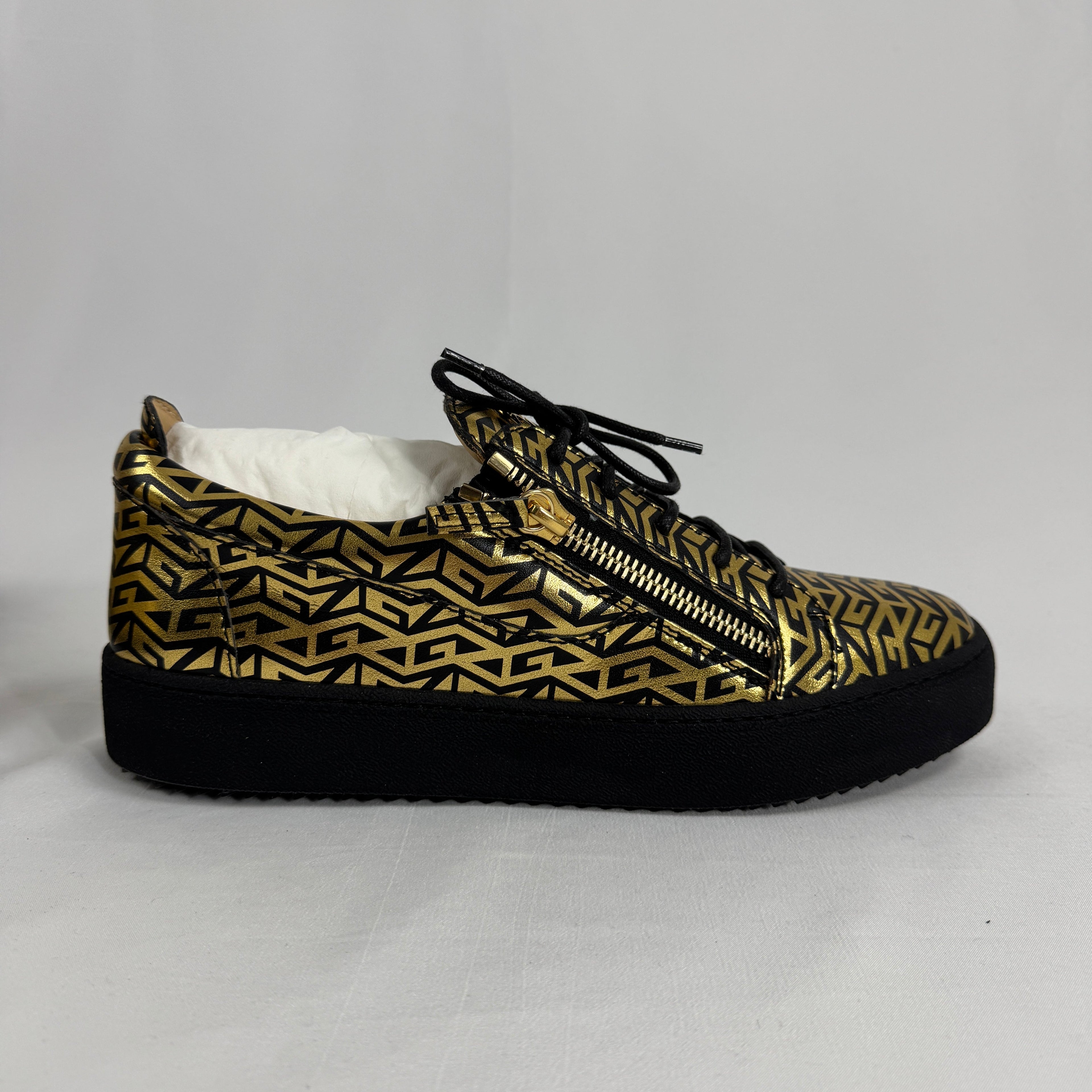 The Giuseppe Zanotti Gail Monogram Print is a luxury sneaker that blends bold design with modern streetwear influence.