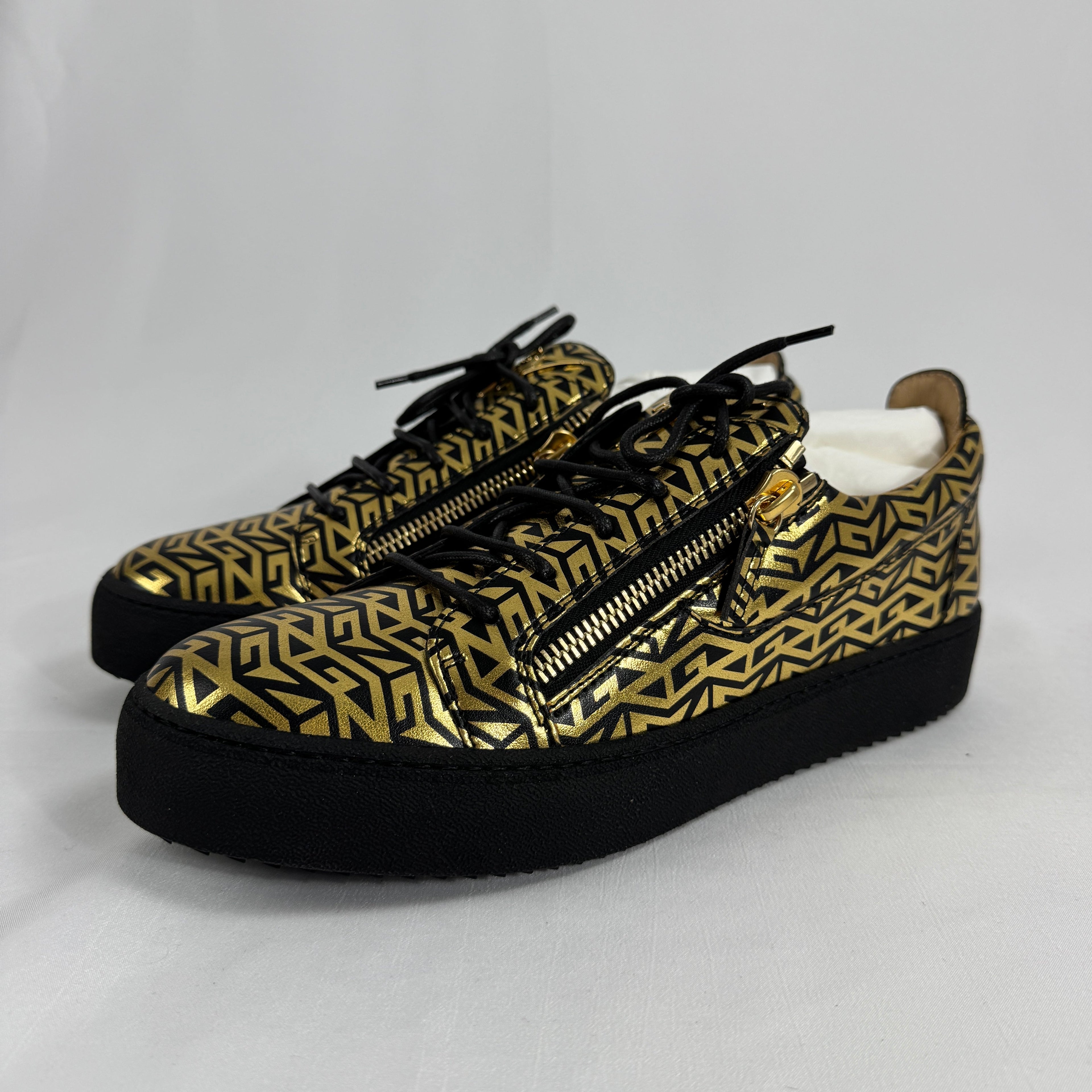 The Giuseppe Zanotti Gail Monogram Print is a luxury sneaker that blends bold design with modern streetwear influence.
