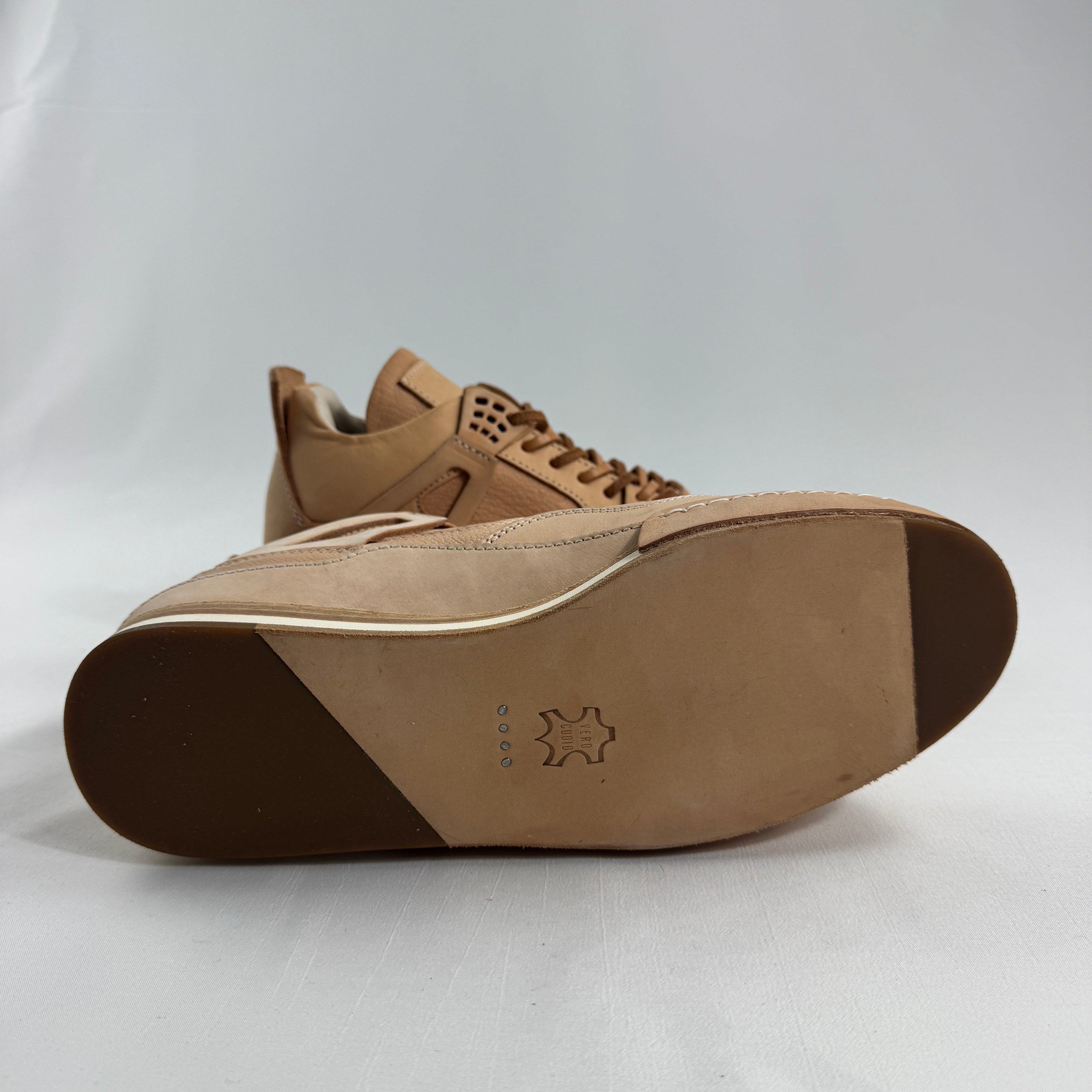 Hender Scheme x Air Jordan 4 “Natural” is a luxurious handcrafted reinterpretation of the iconic Air Jordan 4 by Japanese