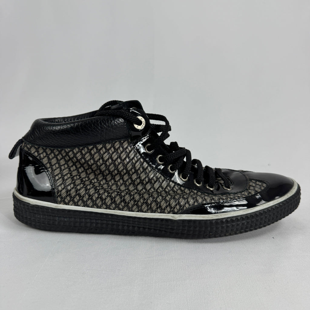 The Jimmy Choo Belgravia High-Top is a luxury sneaker that combines contemporary streetwear style with premium