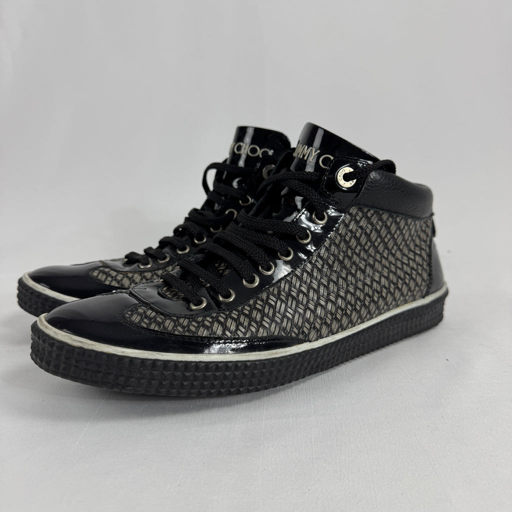 The Jimmy Choo Belgravia High-Top is a luxury sneaker that combines contemporary streetwear style with premium