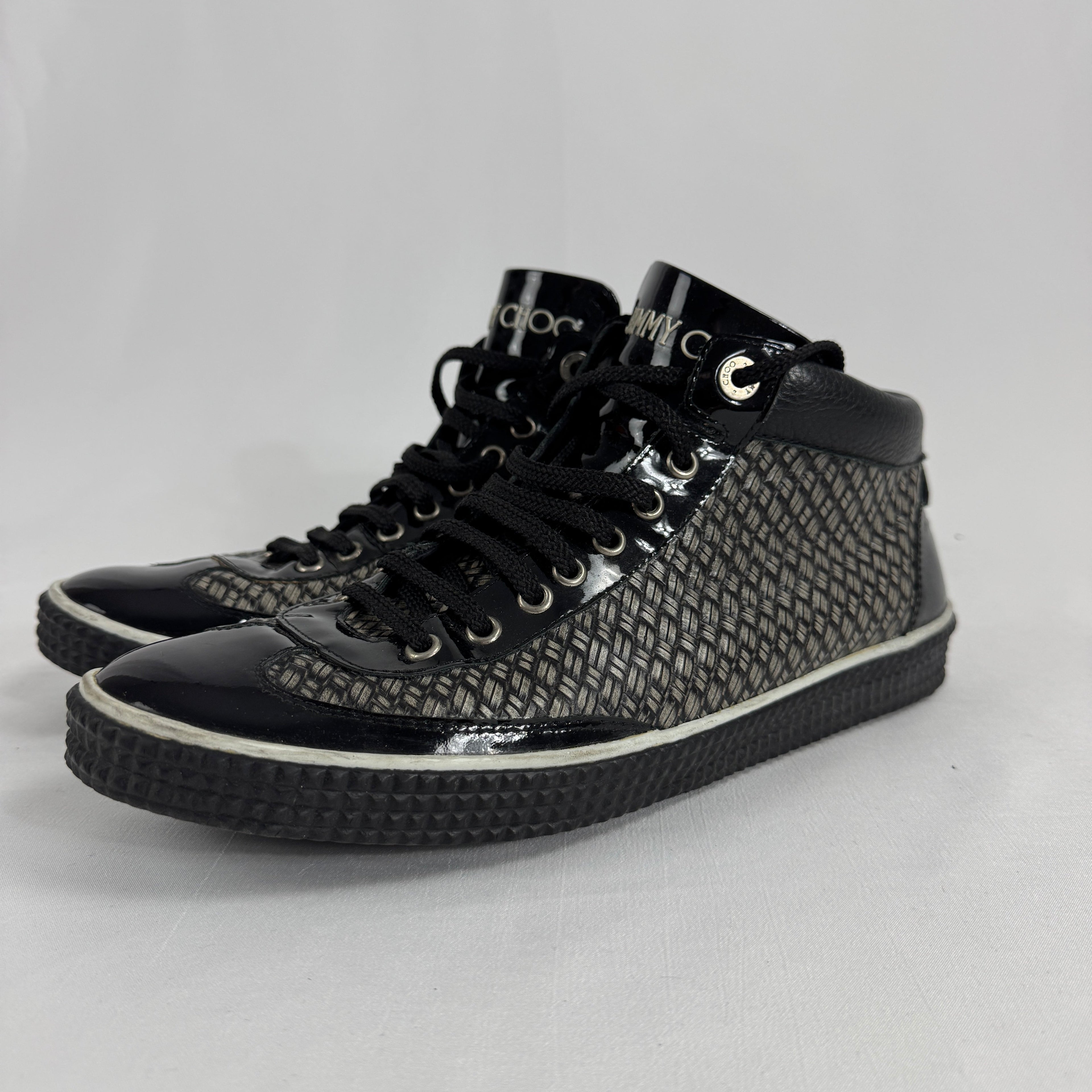 The Jimmy Choo Belgravia High-Top is a luxury sneaker that combines contemporary streetwear style with premium