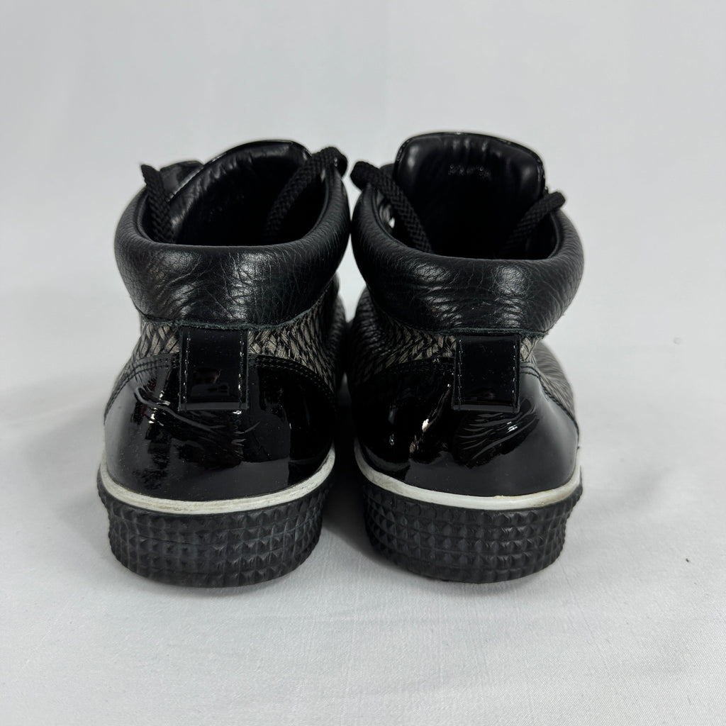 The Jimmy Choo Belgravia High-Top is a luxury sneaker that combines contemporary streetwear style with premium
