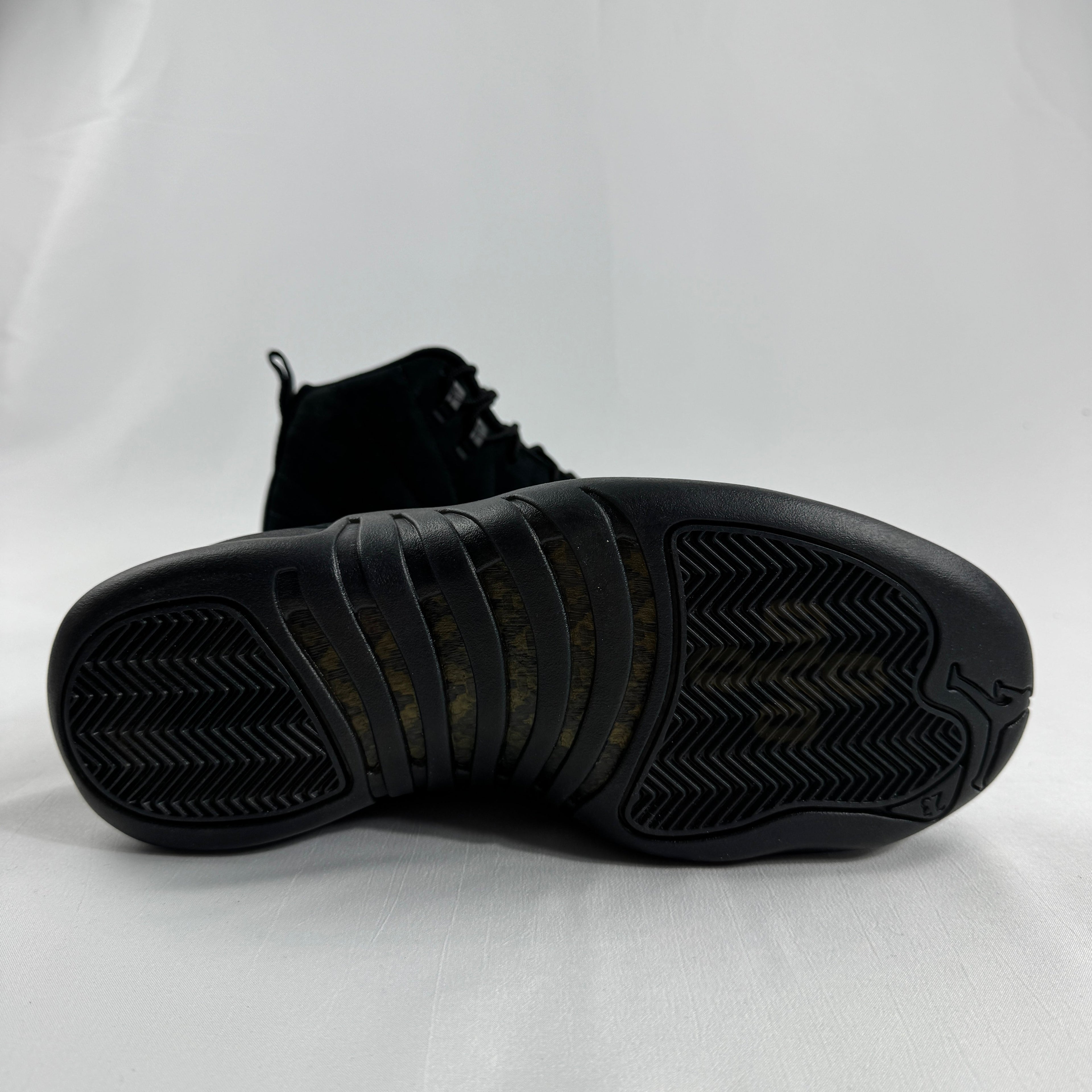 The Jordan 12 Retro “OVO Black” is a premium collaboration between Jordan Brand and Drake’s OVO label. Released in extremely