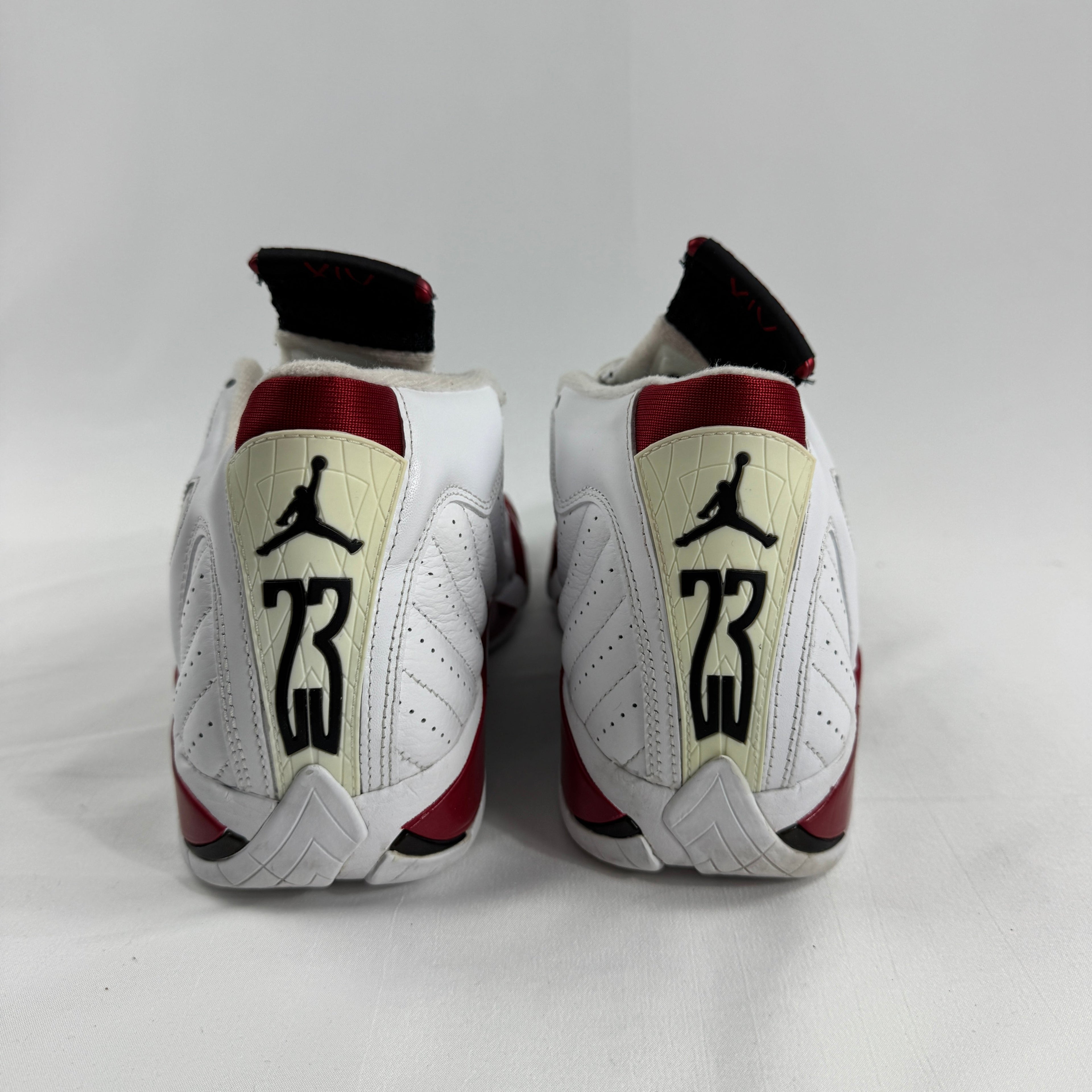 The Jordan 14 Retro "Candy Cane" (2012) is a classic re-release of one of the most recognizable Air Jordan 14 colorways.