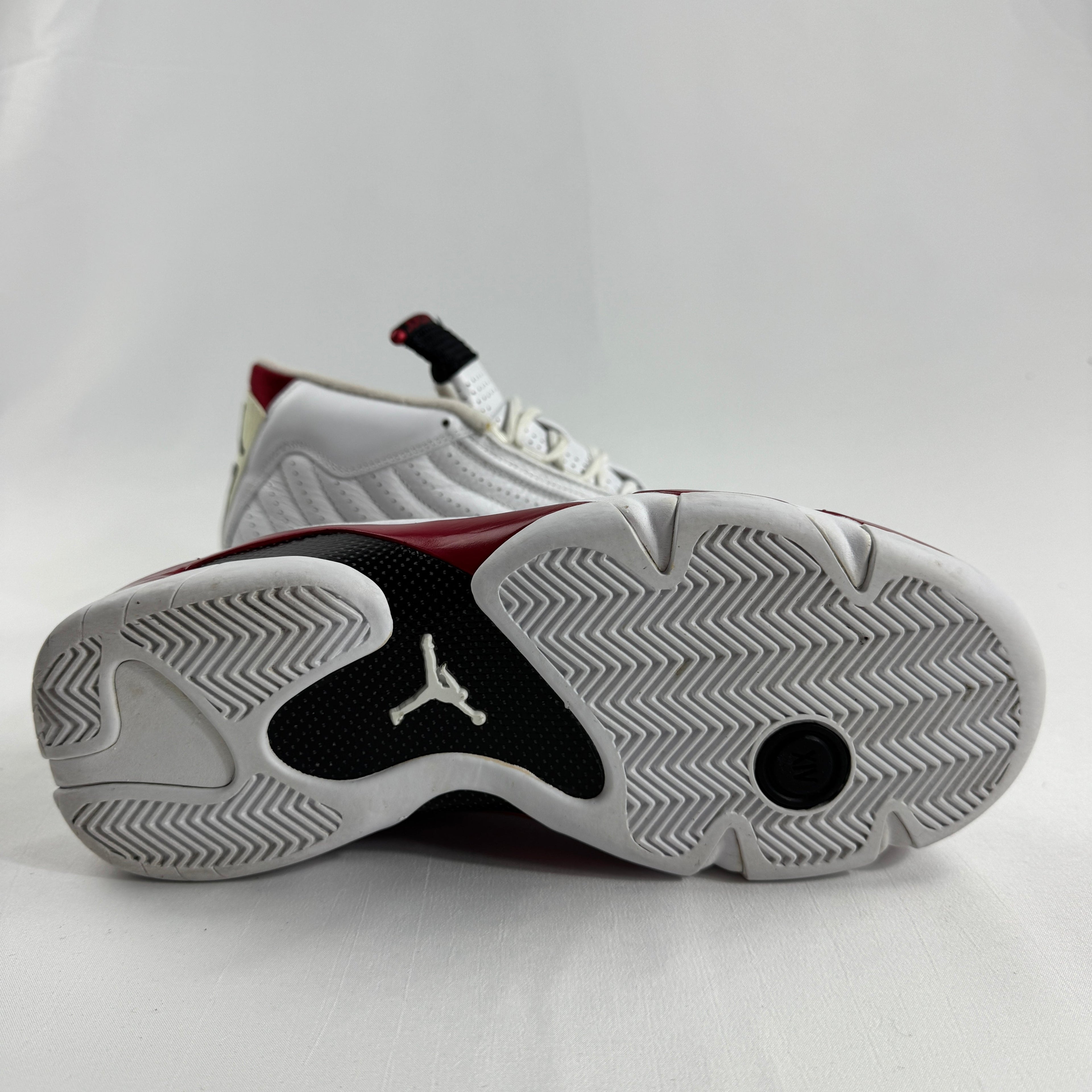 The Jordan 14 Retro "Candy Cane" (2012) is a classic re-release of one of the most recognizable Air Jordan 14 colorways.