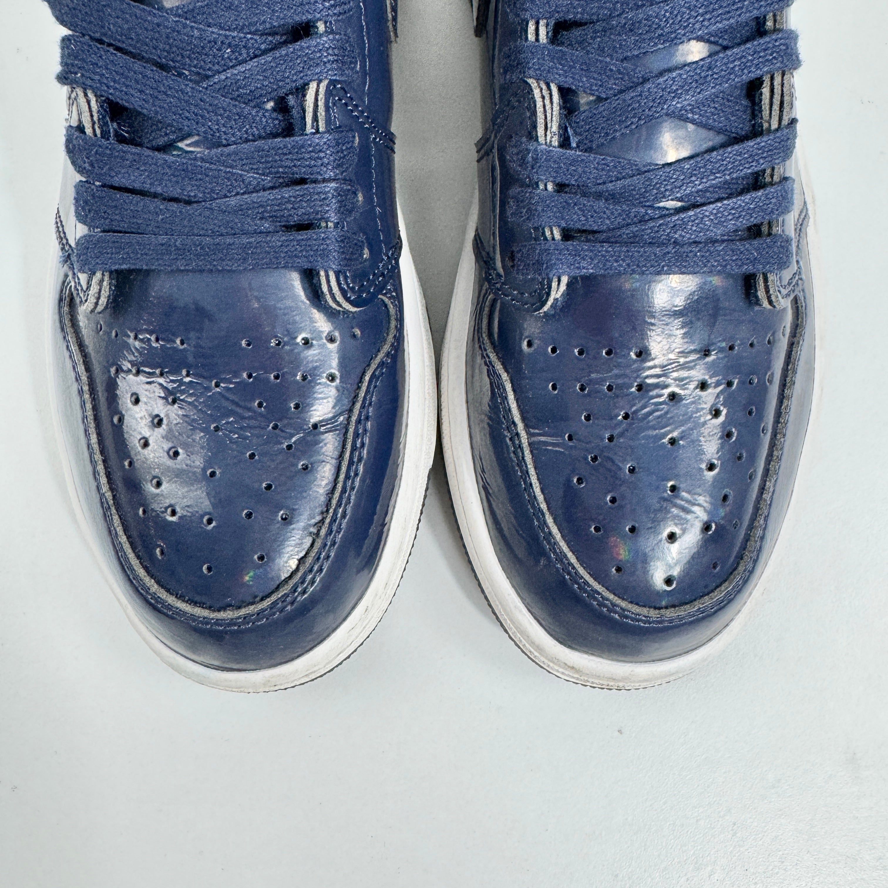 The Jordan 1 Retro Dover Street Market combines the timeless Air Jordan 1 silhouette with premium craftsmanship and
