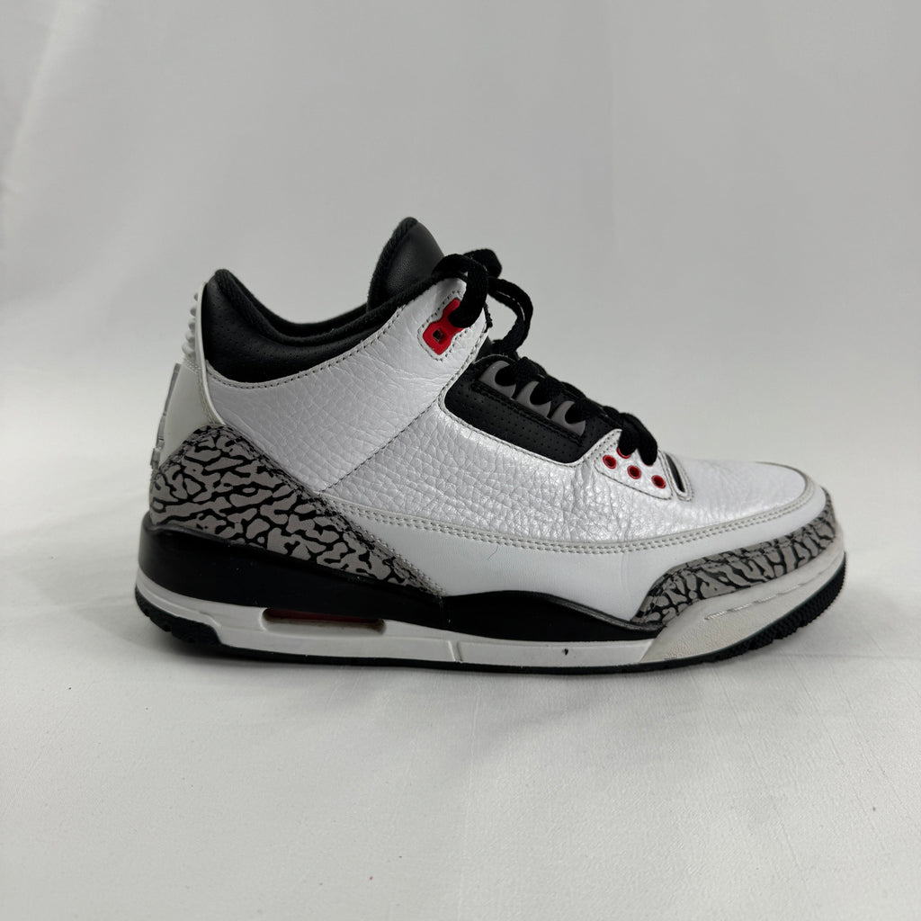 The Air Jordan 3 Retro “Pure Money/Infrared” is a mostly white leather Jordan 3 with silver accents and subtle infrared red