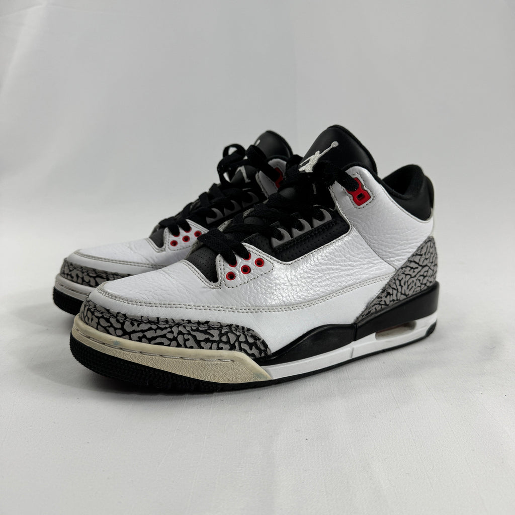 The Air Jordan 3 Retro “Pure Money/Infrared” is a mostly white leather Jordan 3 with silver accents and subtle infrared red