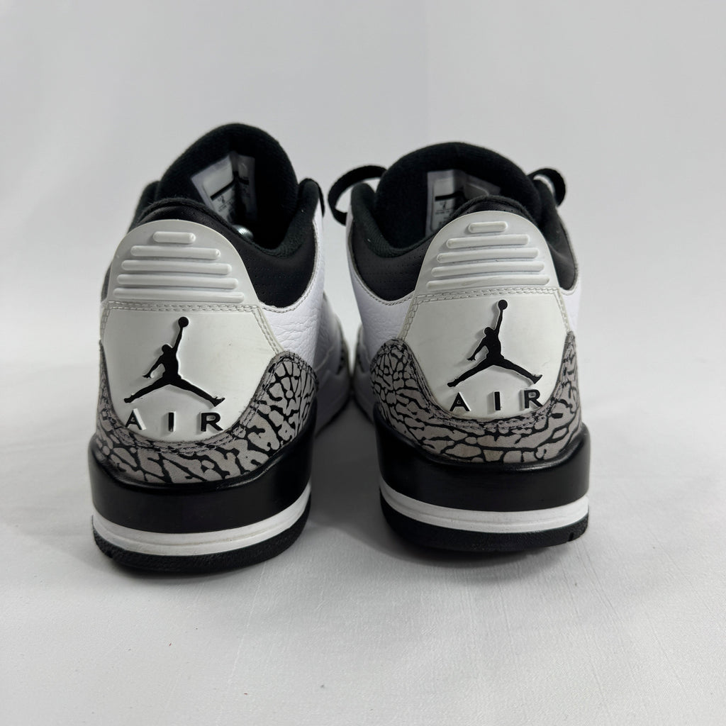 The Air Jordan 3 Retro “Pure Money/Infrared” is a mostly white leather Jordan 3 with silver accents and subtle infrared red