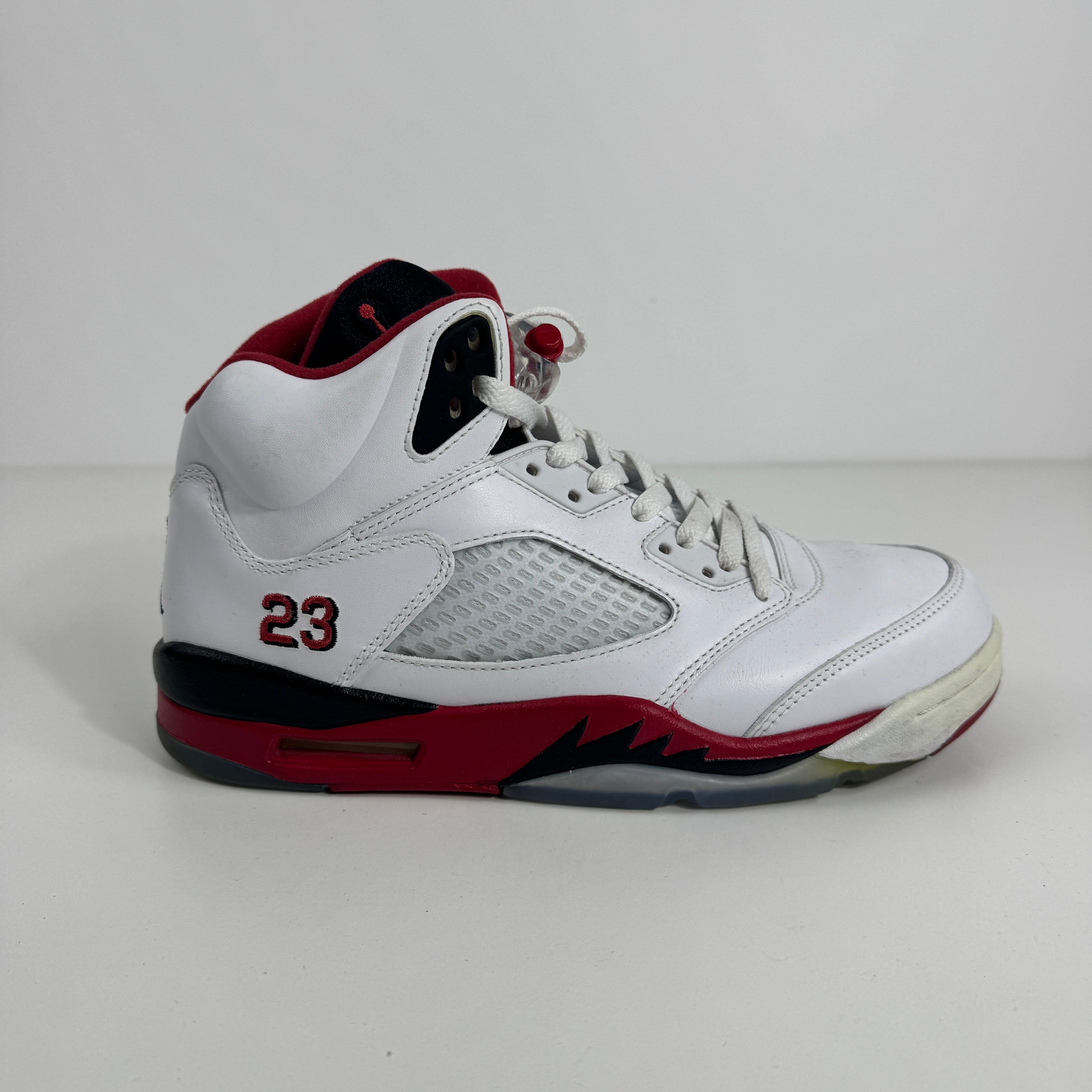 Air Jordan 5 Retro Fire Red is a classic basketball sneaker that brings back one of the most iconic colorways in the Jordan