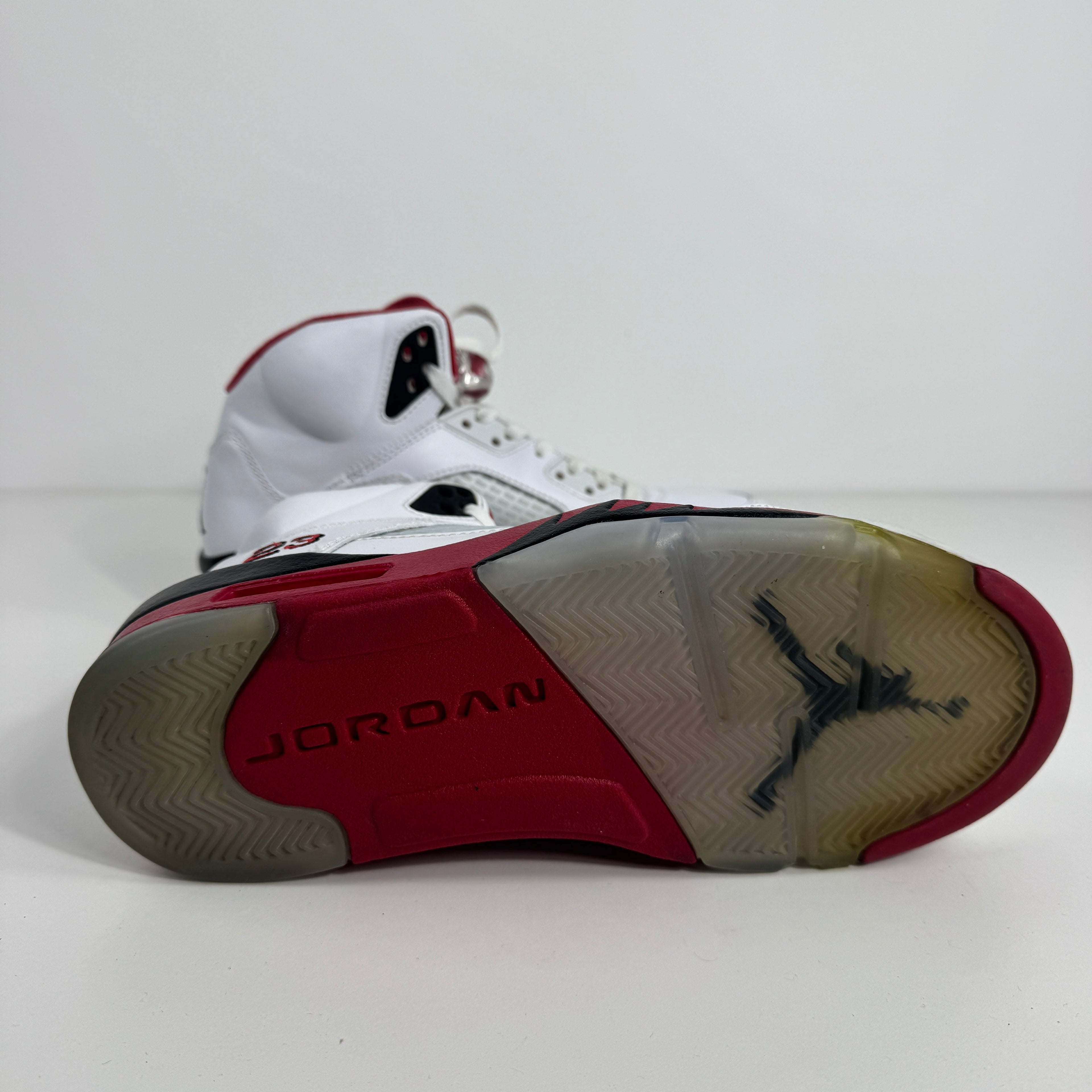 Air Jordan 5 Retro Fire Red is a classic basketball sneaker that brings back one of the most iconic colorways in the Jordan