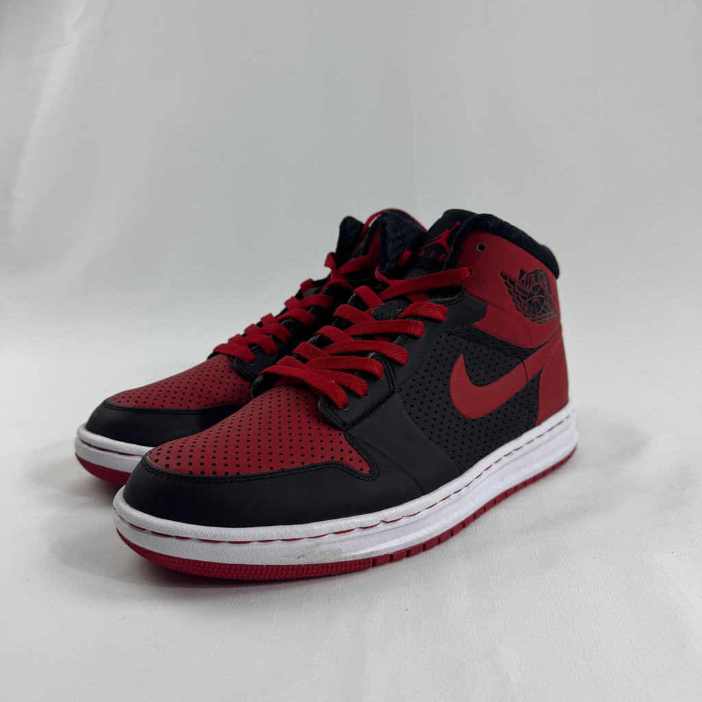The Jordan Alpha 1 “Bred” is a modern performance-inspired take on the classic Air Jordan 1 silhouette. Featuring the iconic