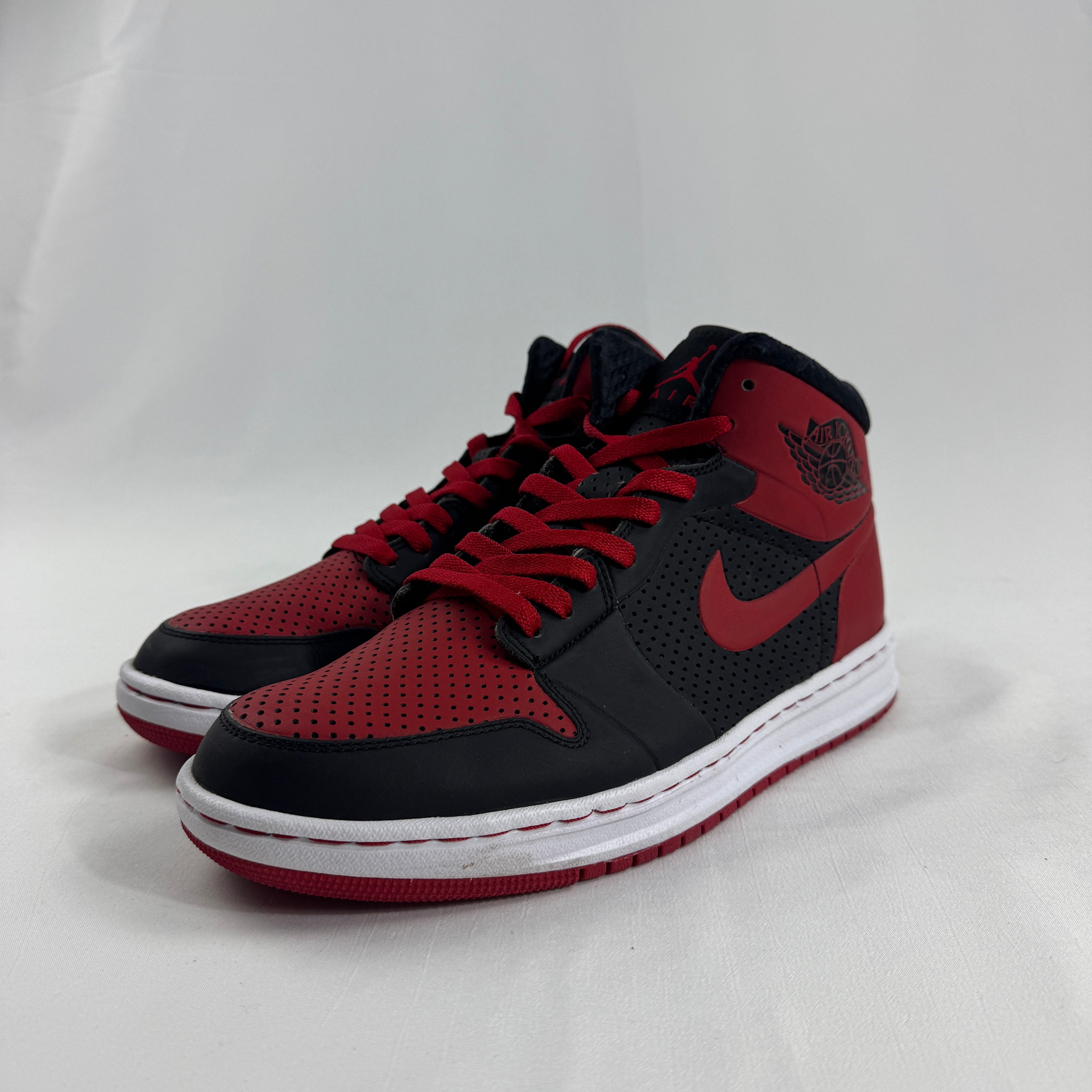 The Jordan Alpha 1 “Bred” is a modern performance-inspired take on the classic Air Jordan 1 silhouette. Featuring the iconic