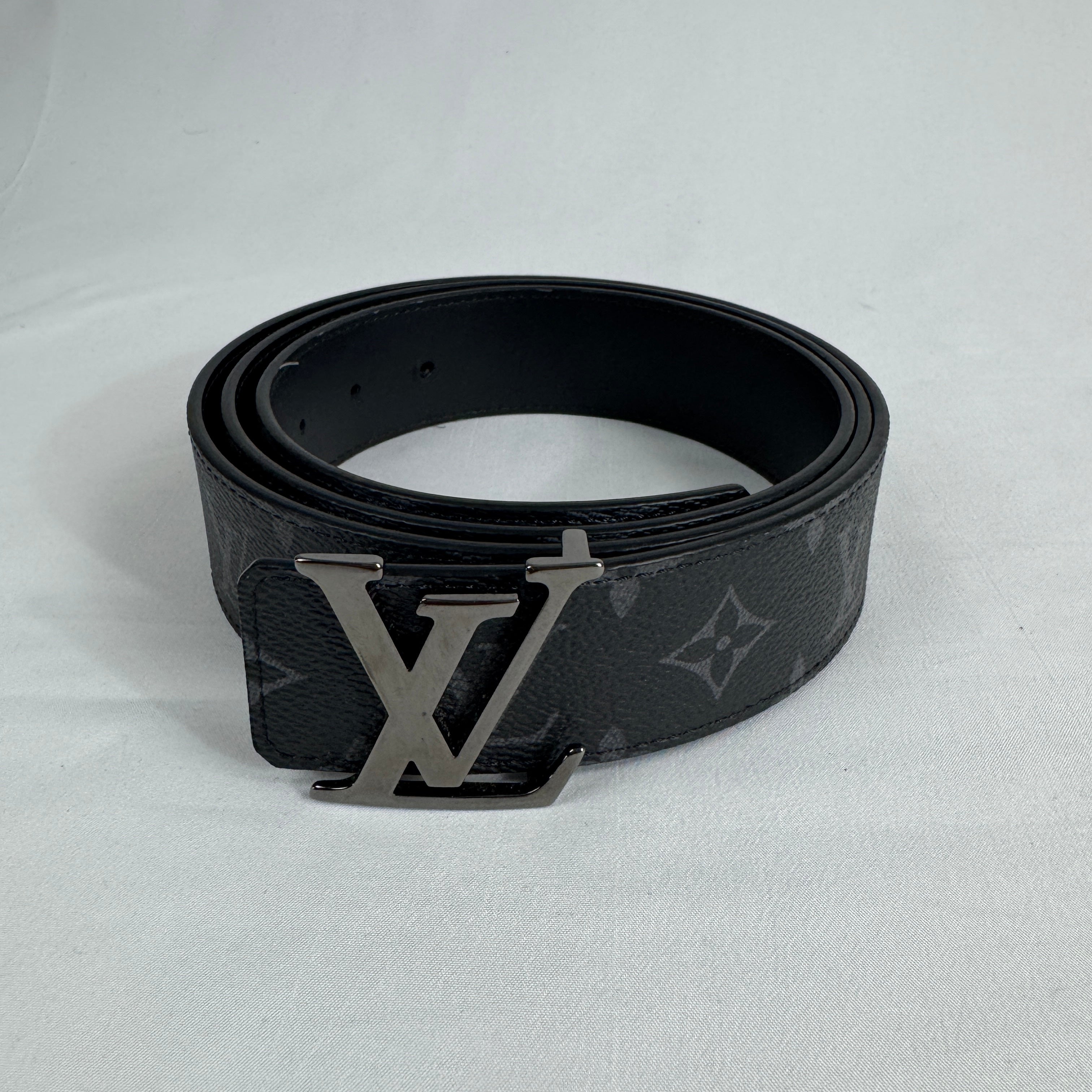 The Louis Vuitton Reversible Belt Eclipse is a luxury accessory crafted from premium leather, featuring a reversible design