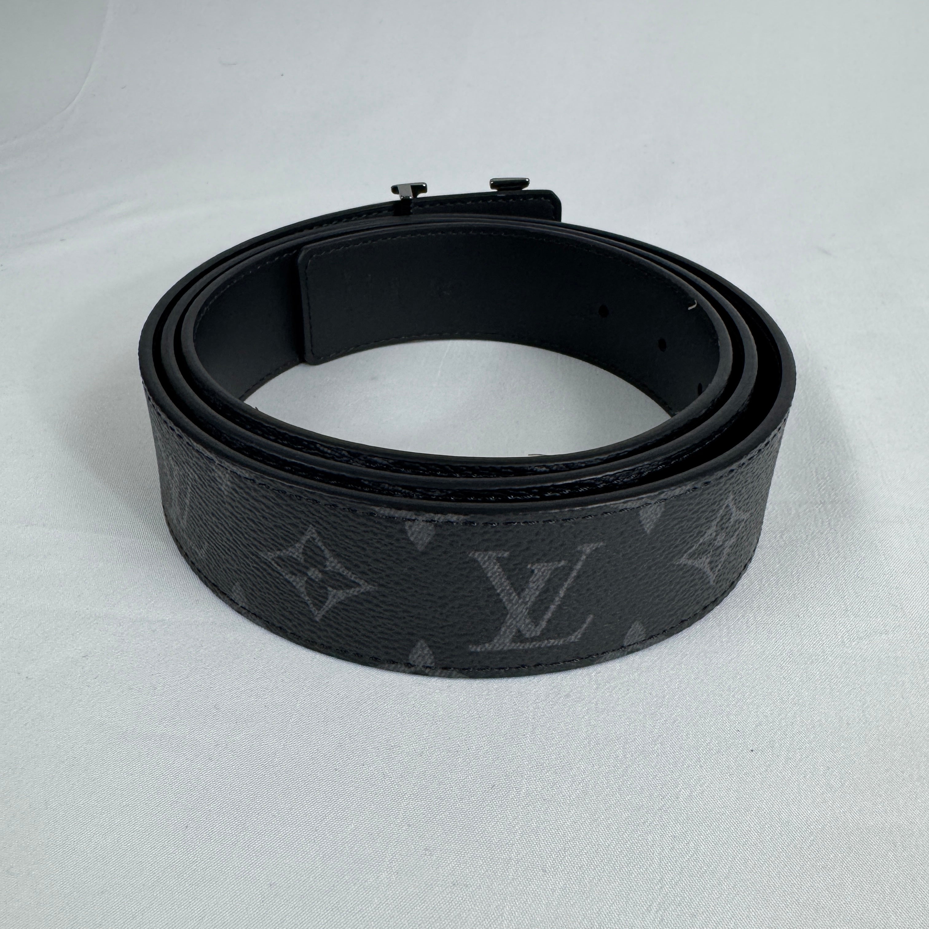 The Louis Vuitton Reversible Belt Eclipse is a luxury accessory crafted from premium leather, featuring a reversible design