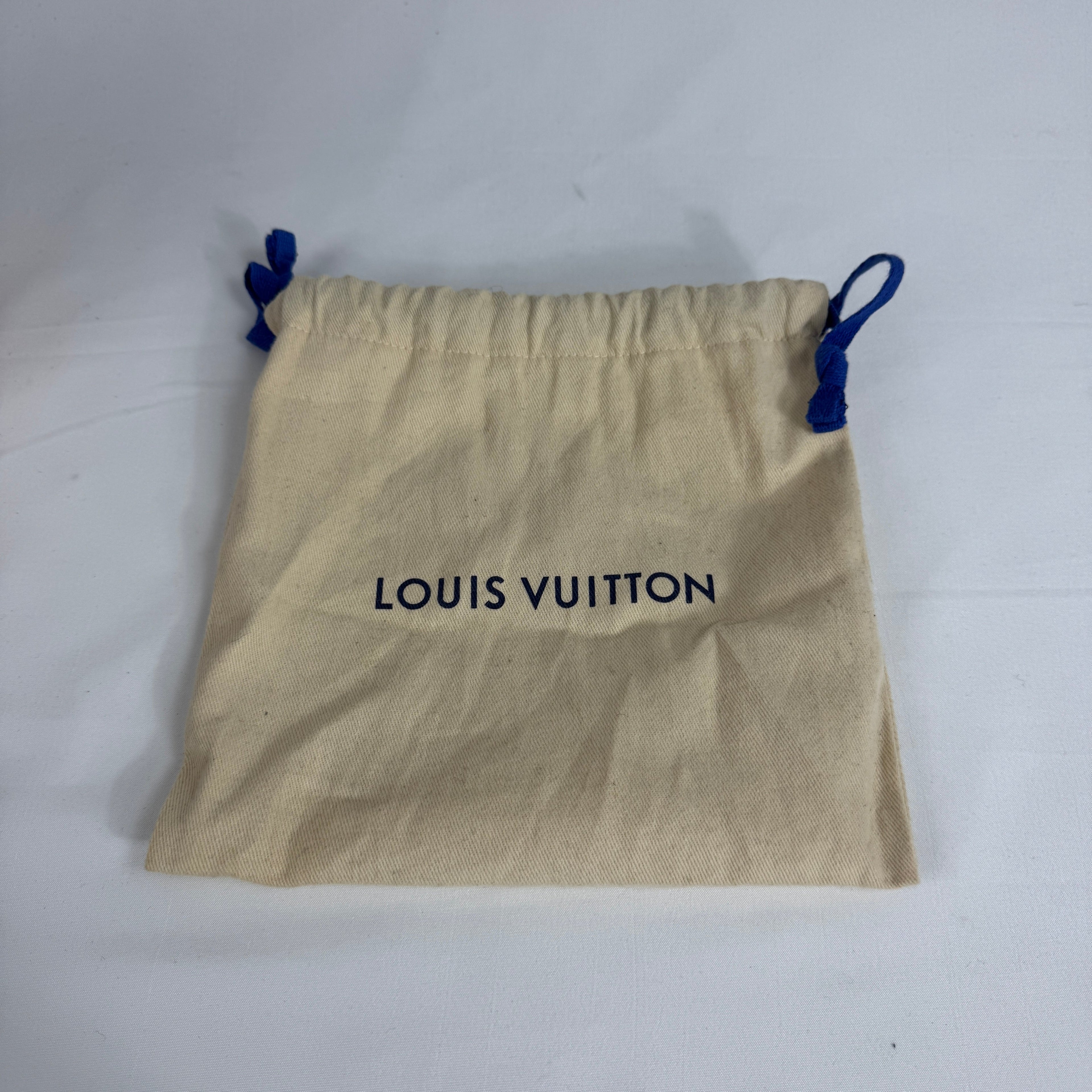 The Louis Vuitton Reversible Belt Eclipse is a luxury accessory crafted from premium leather, featuring a reversible design